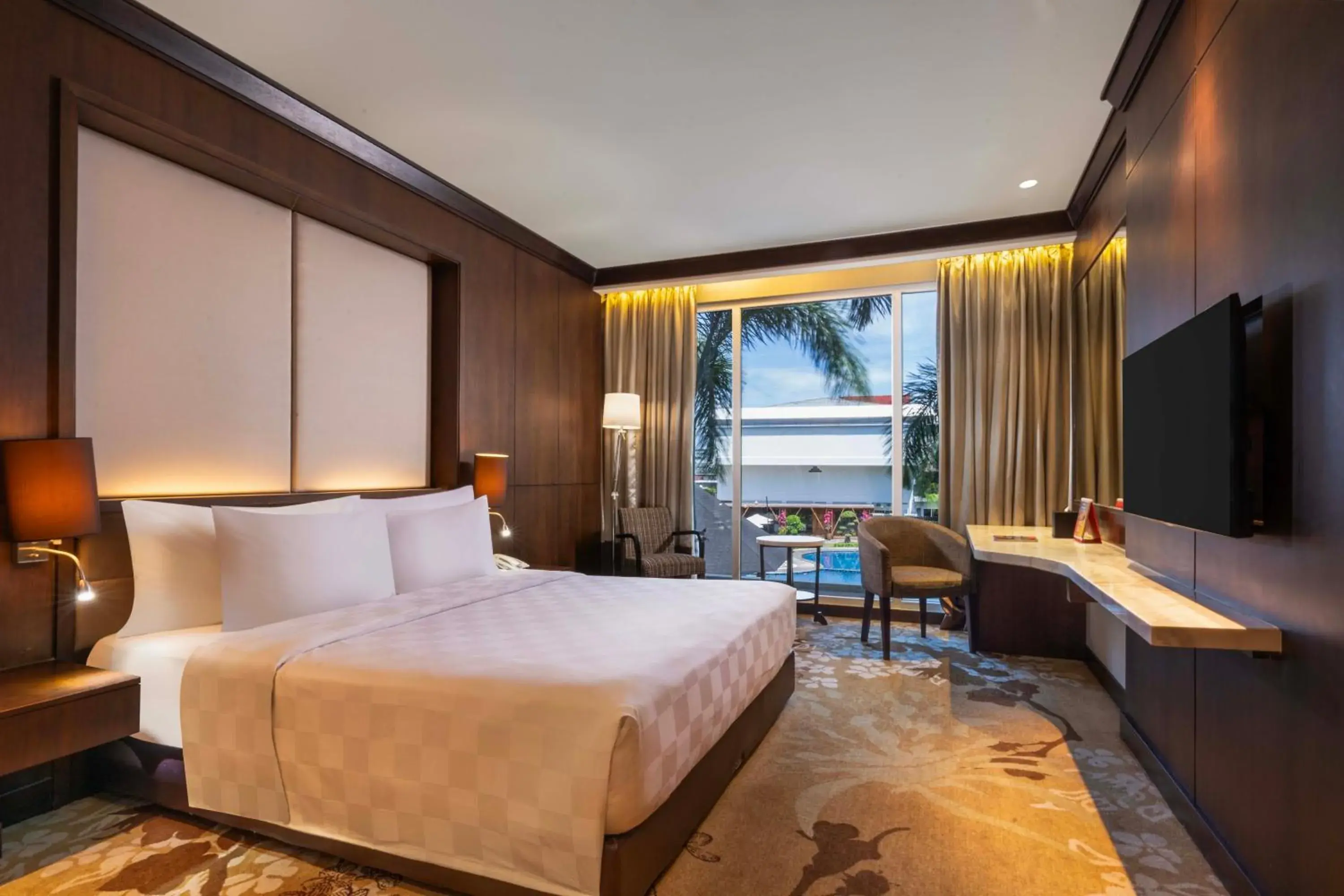 Deluxe King Pool View - single occupancy in Swiss-Belhotel Borneo Banjarmasin Deluxe King Pool View - single occupancy in Swiss-Belhotel Borneo Banjarmasin