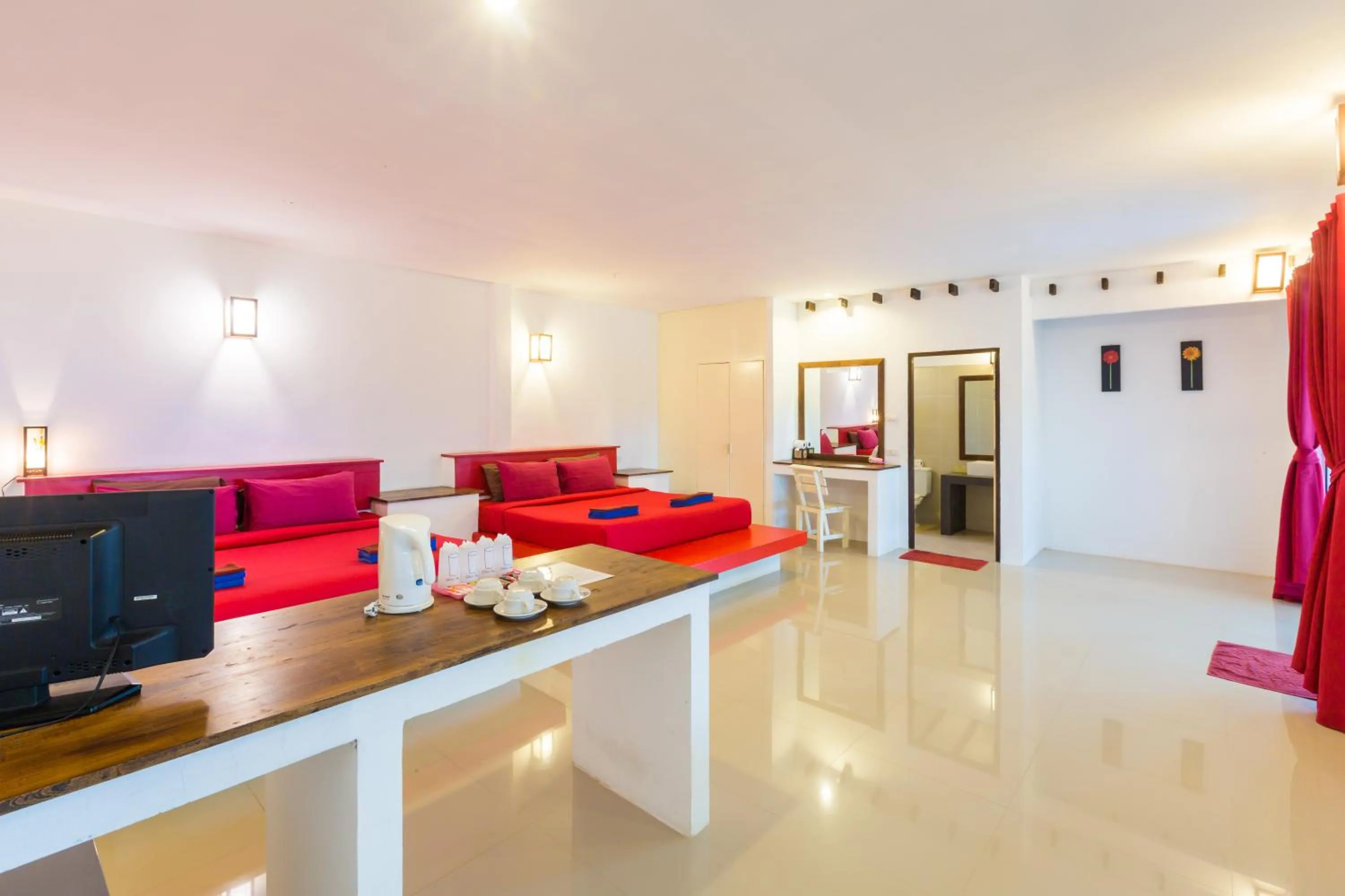 Bed in Da Kanda Villa Beach Resort