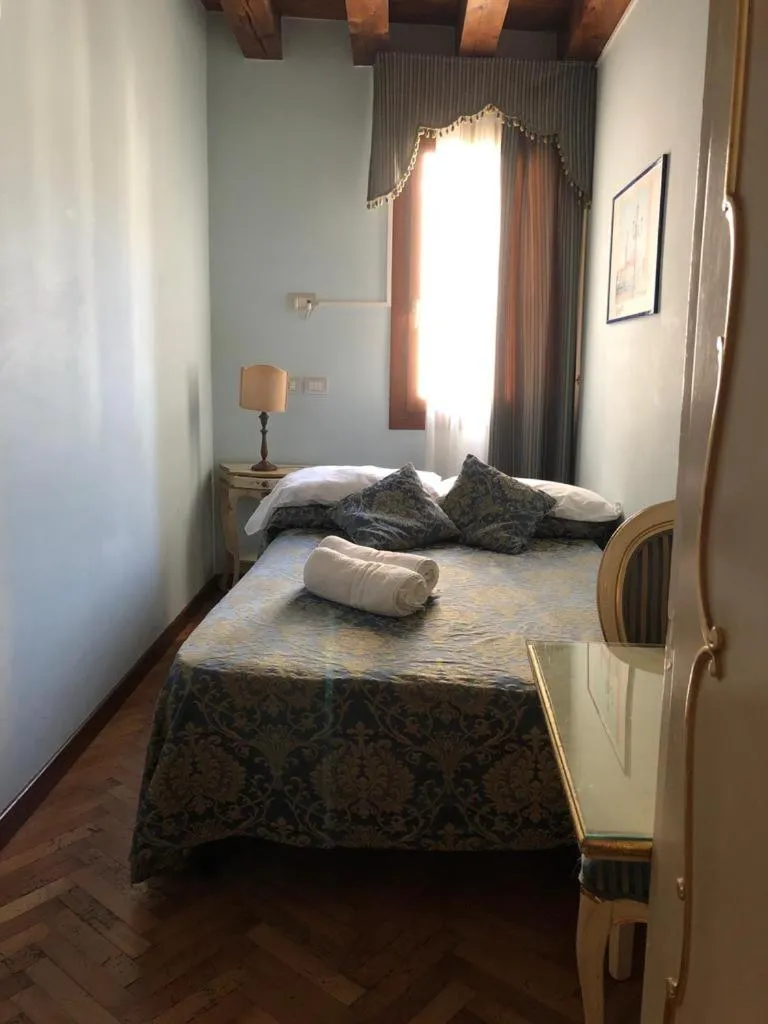 Bed in Alloggi Santa Sofia