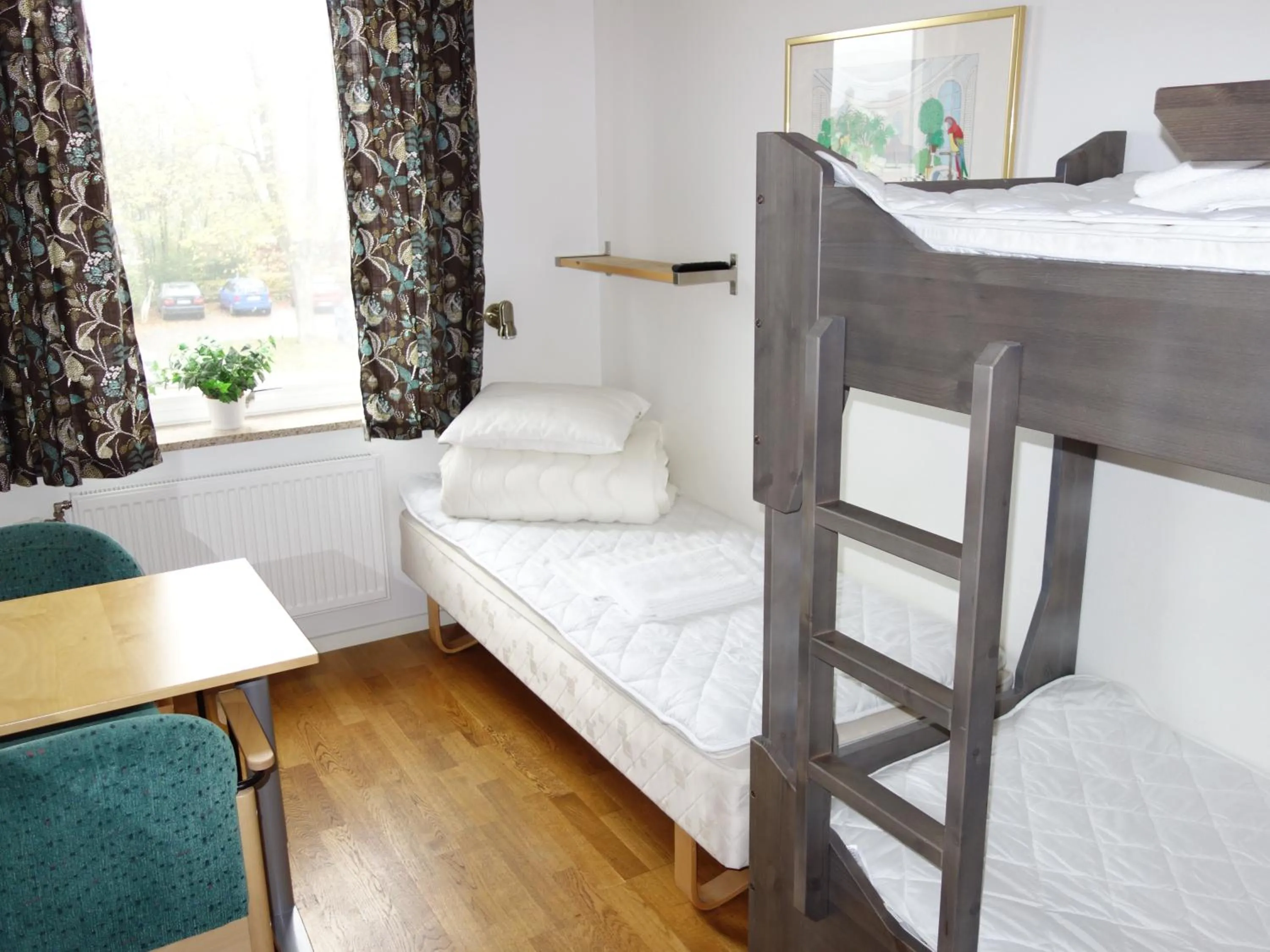 Bed in Torget Vandrarhem