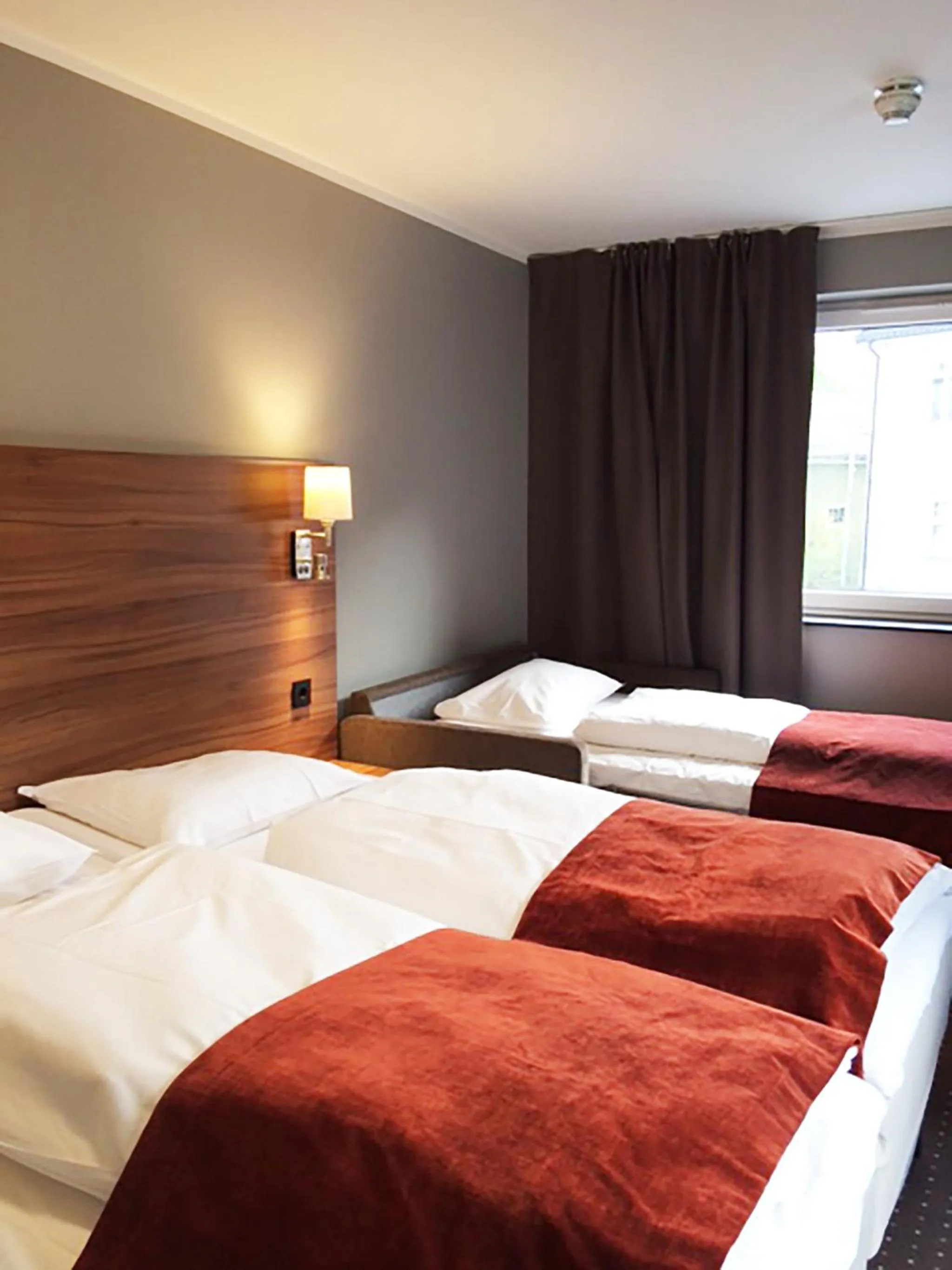 Bed in Thon Partner Hotel Otta