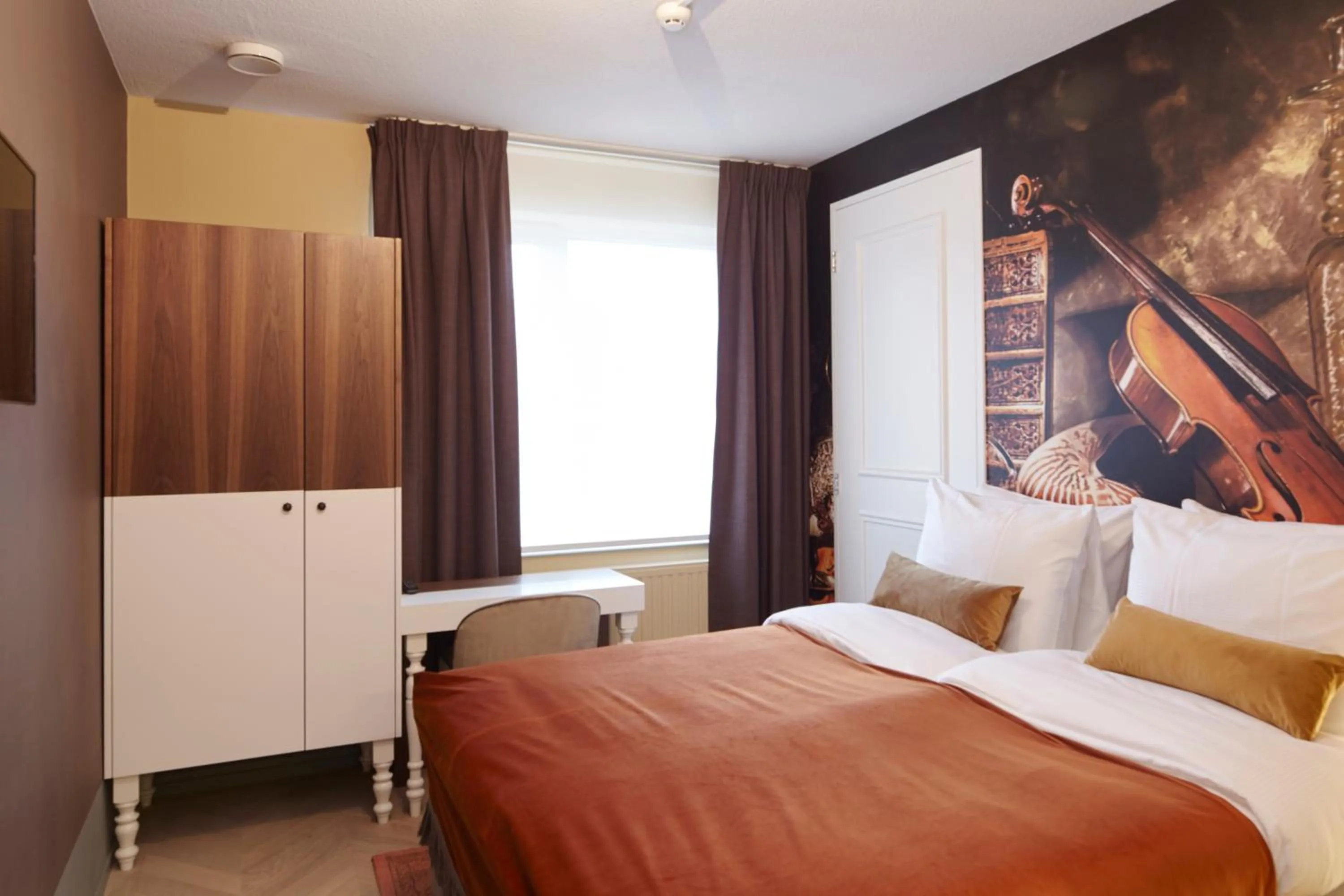 Photo of the whole room, Bed in The Muse Amsterdam - Boutique Hotel