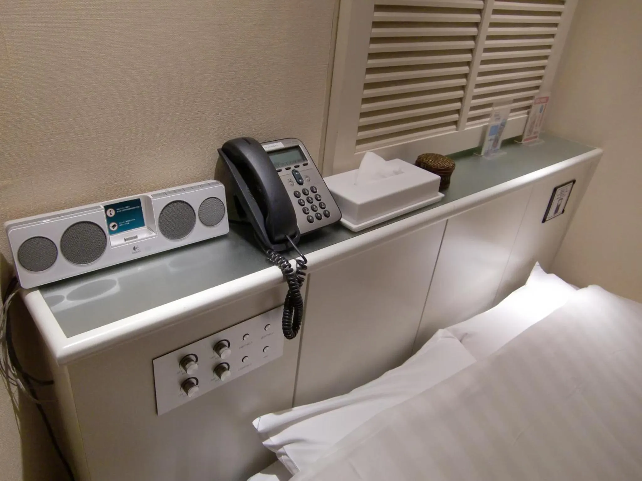 Bed, Kitchen/Kitchenette in Hotel Rplus