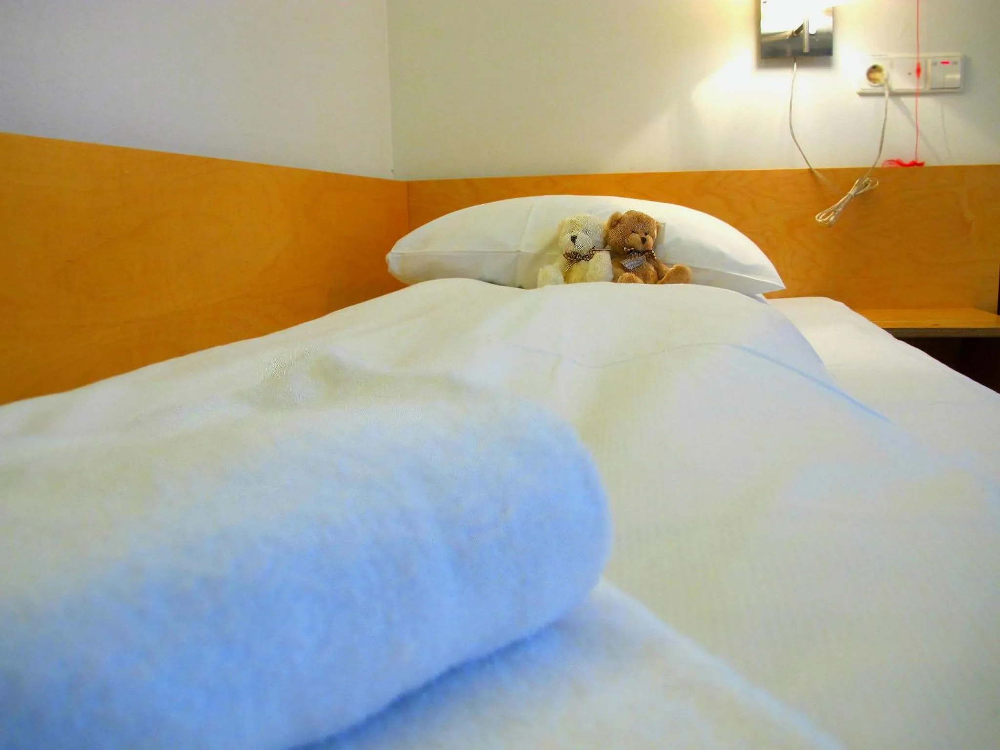 Bed in Hotel St. Olav