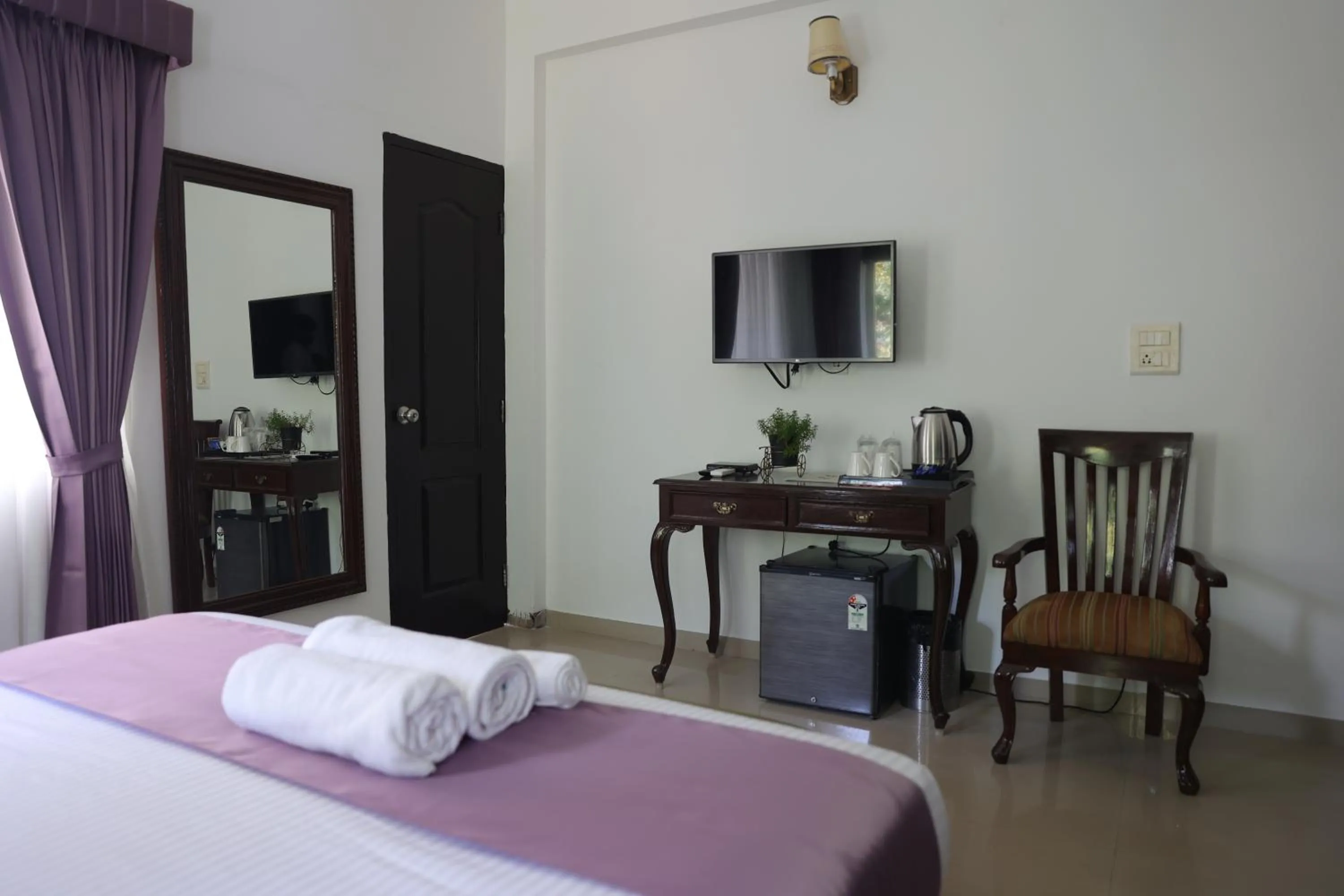 Bed in Casa Ahaana Resort Vagator, By Lavin Hotels