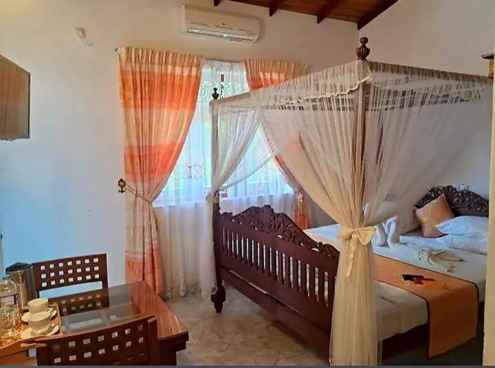 Bed in Lucky Prince Villa & Ayurveda Wellness