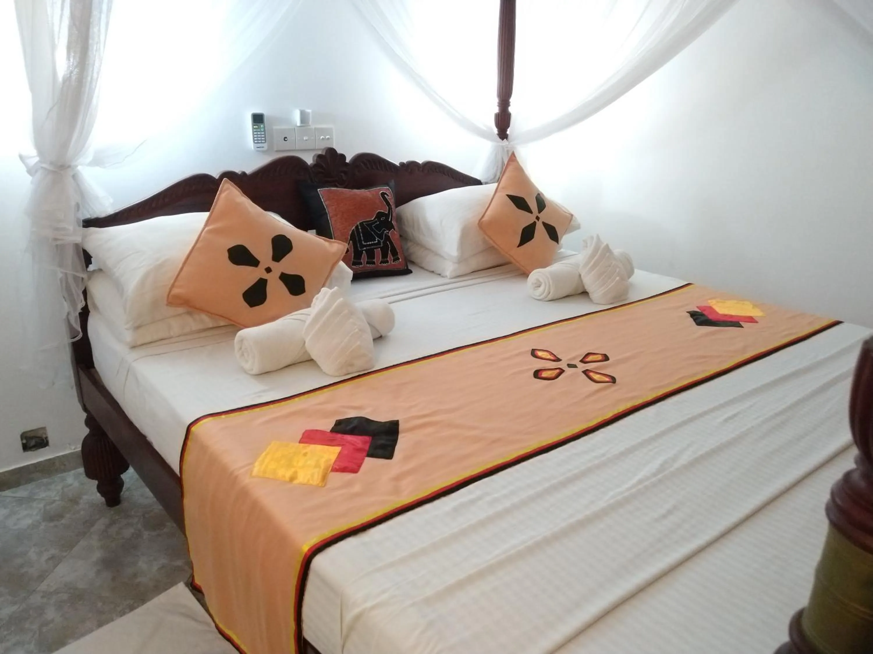 Bed in Lucky Prince Villa & Ayurveda Wellness