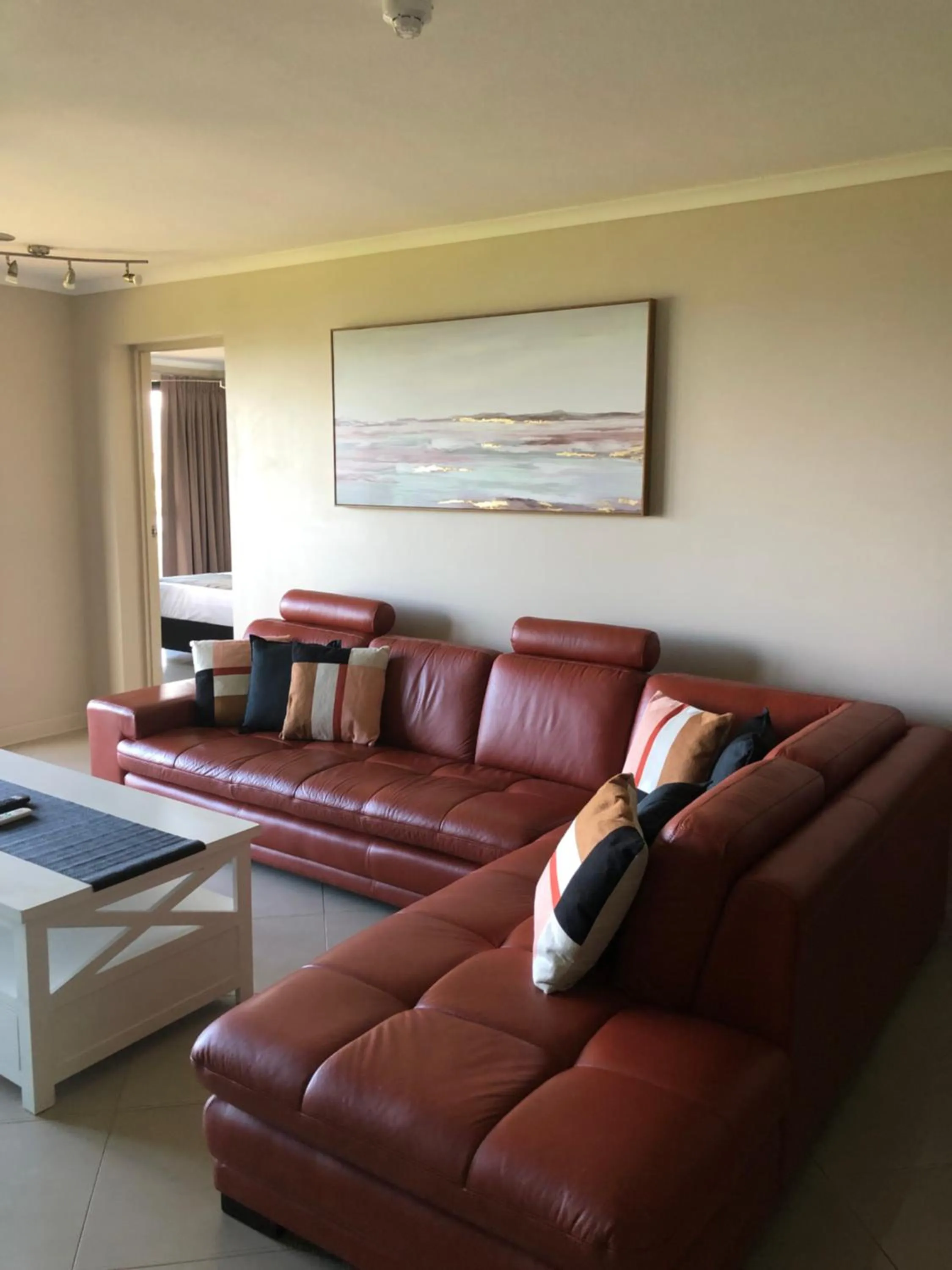 Living room in Coral Towers Holiday Suites