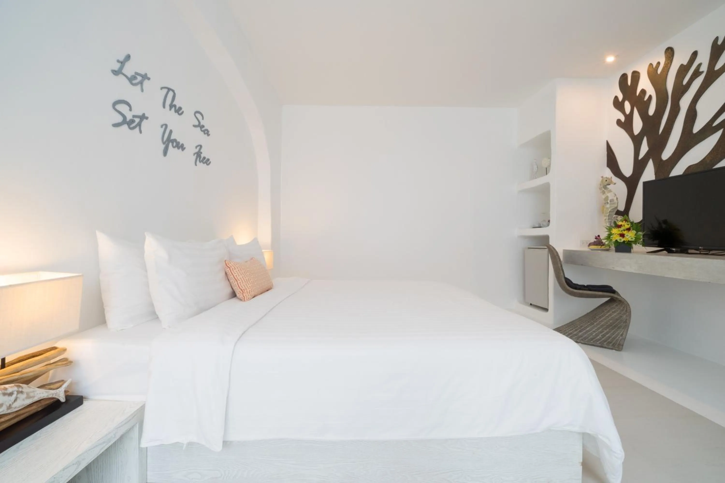 Bed in Ocean Breeze Resort Khaolak