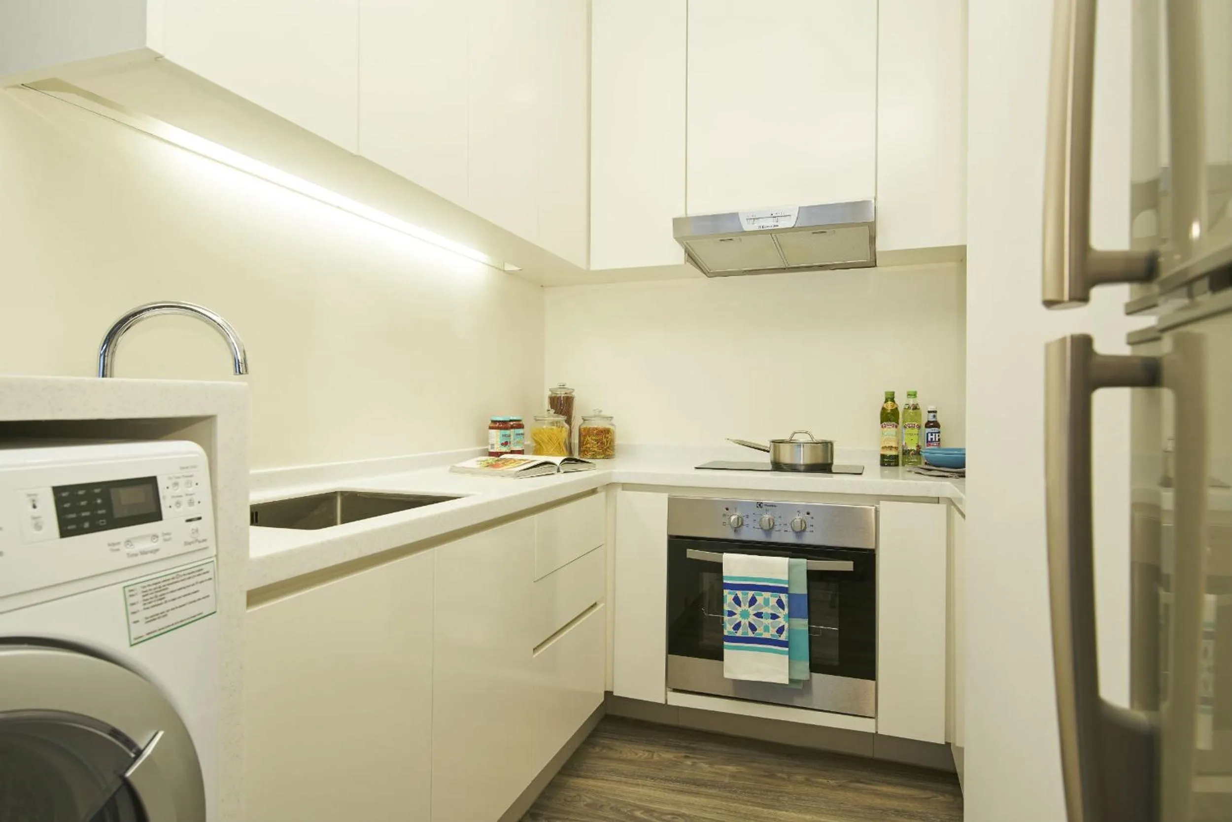 Kitchen or kitchenette in PARKROYAL Serviced Suites Singapore