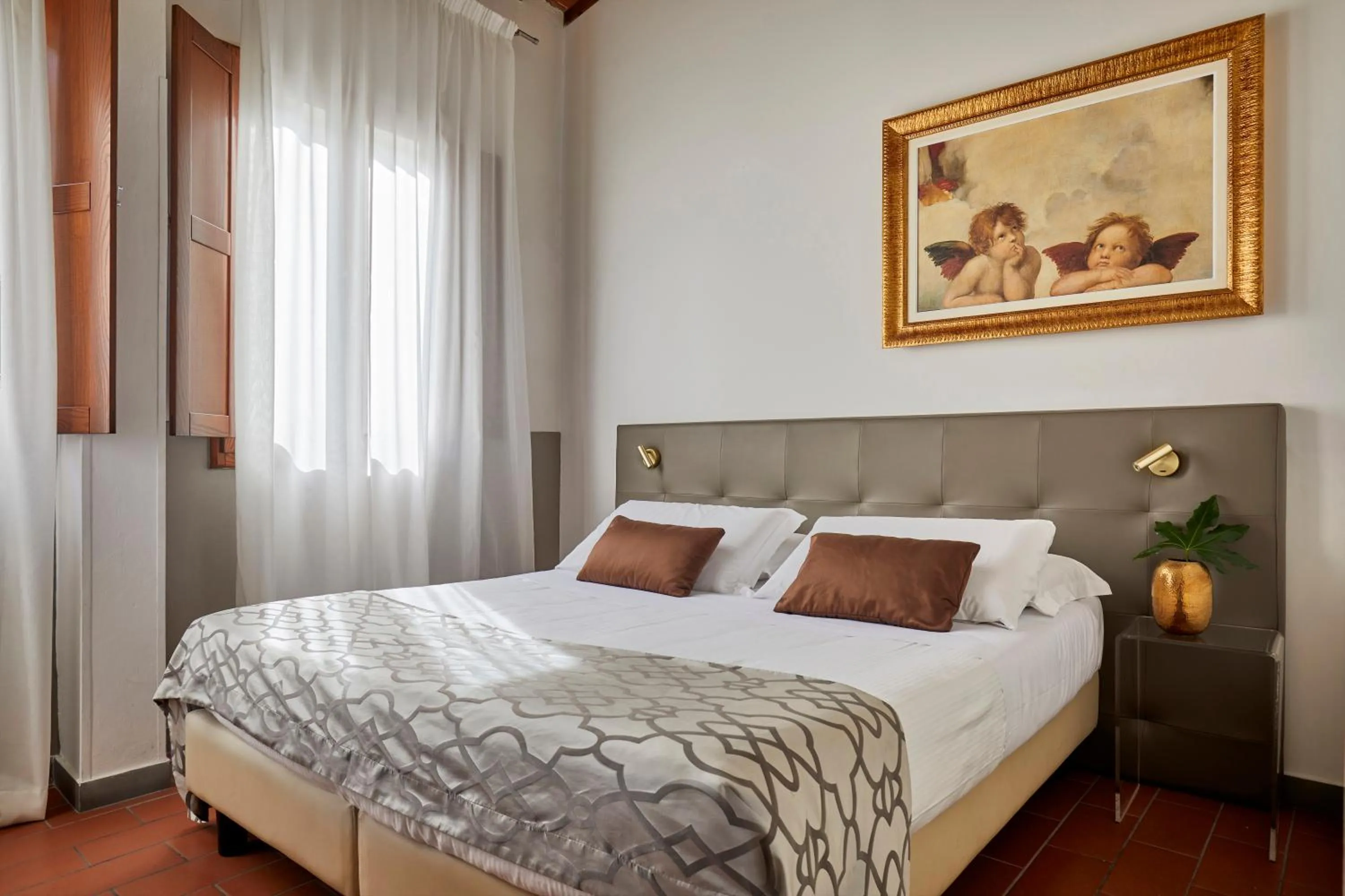 Bed in Sette Angeli Rooms