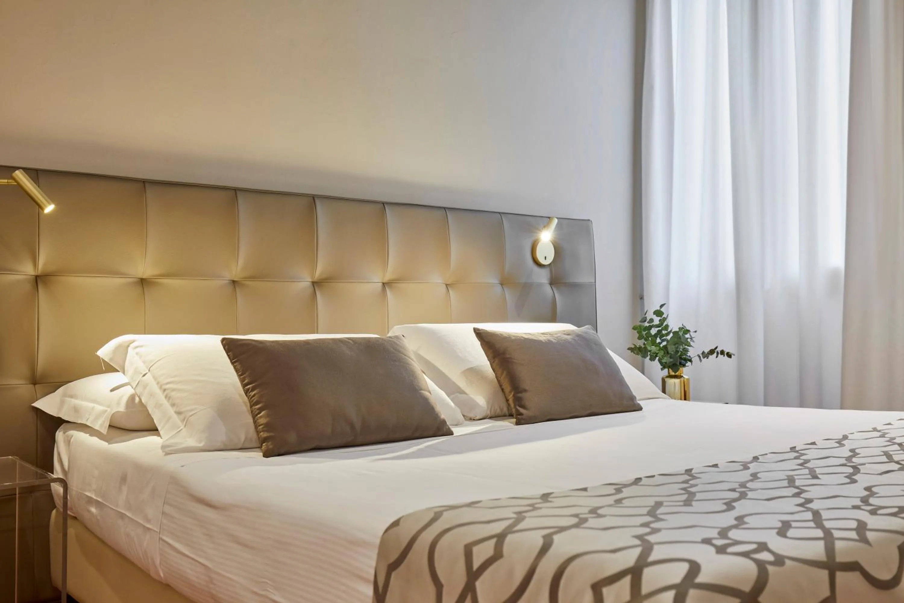 Bed in Sette Angeli Rooms