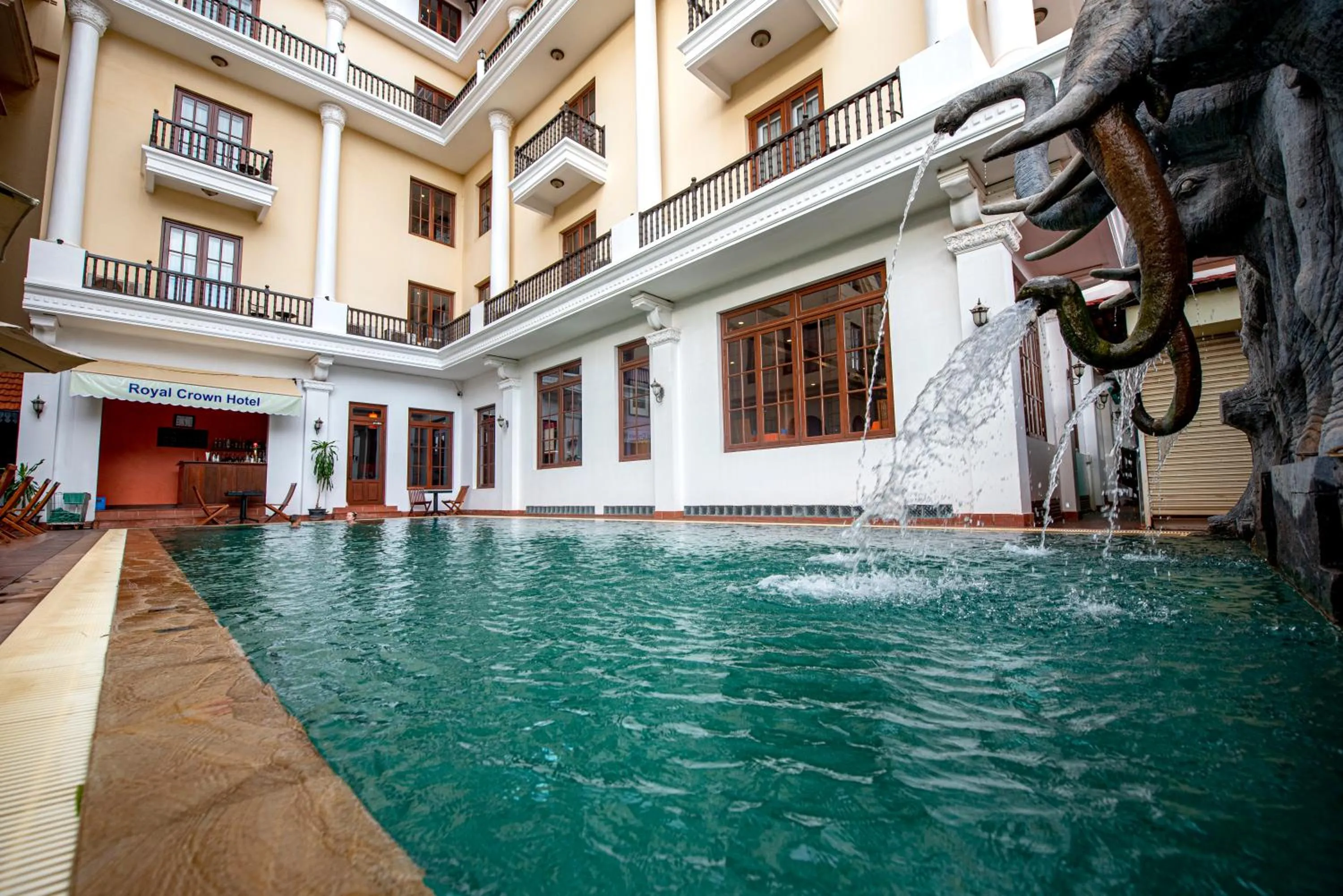 Swimming pool in The Suite By Royal Crown Hotel