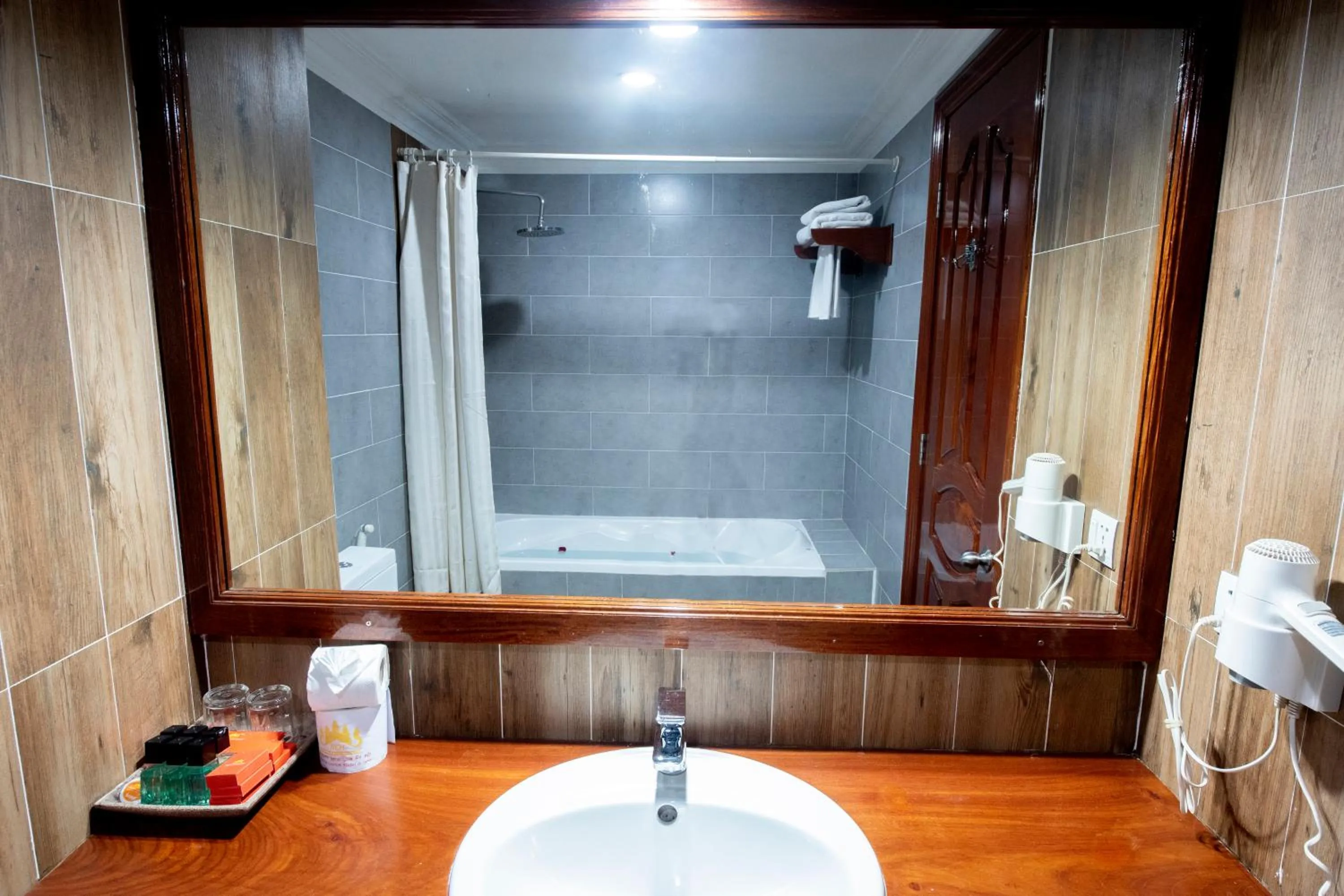 Bathroom in The Suite By Royal Crown Hotel