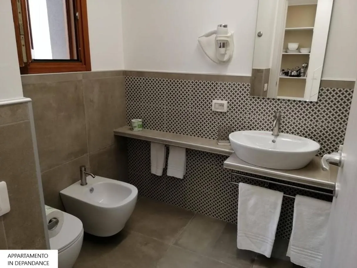 Toilet in Tenute Plaia Agriturismo