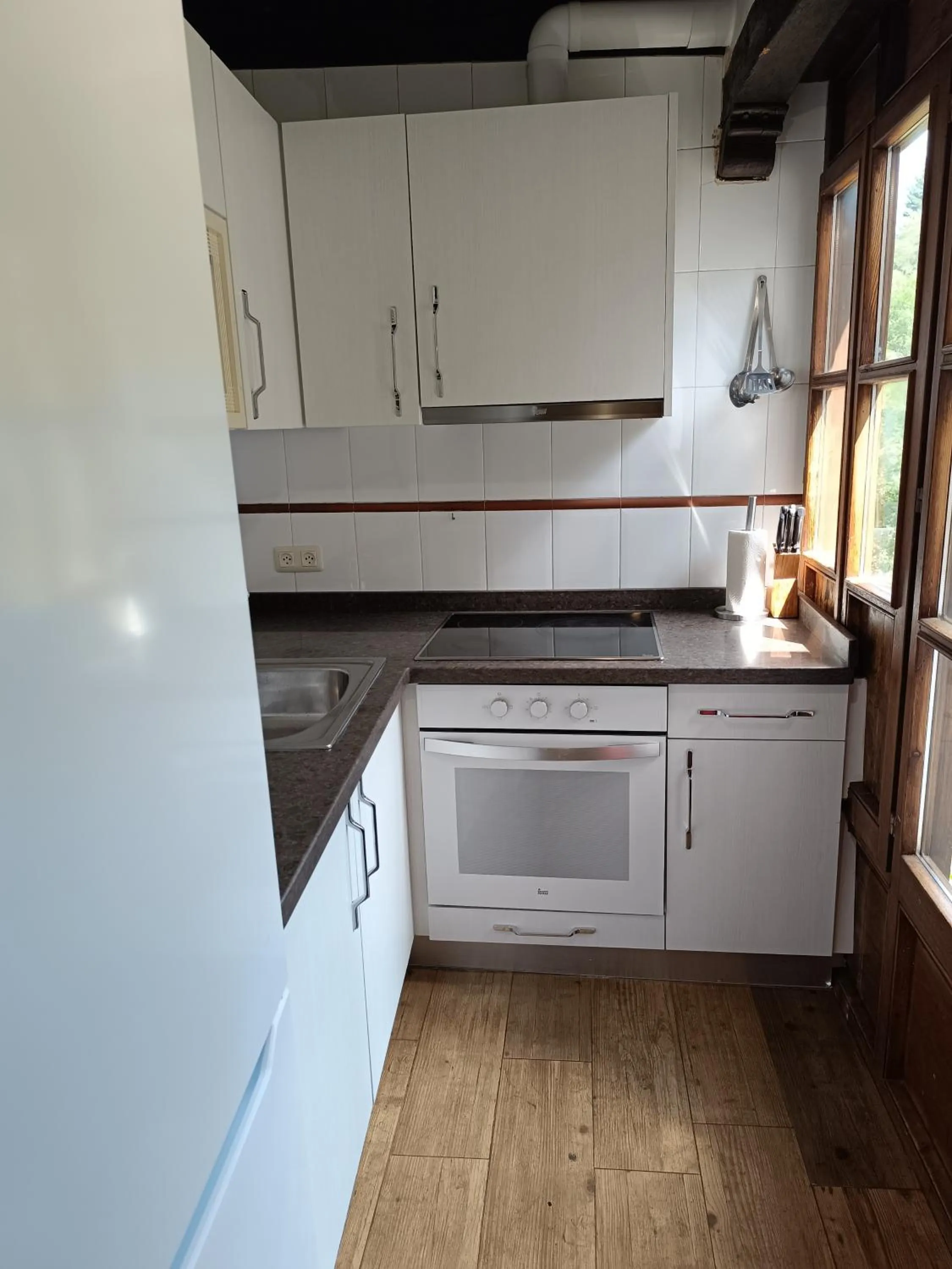 kitchen in Viviendas Rurales El Covaju