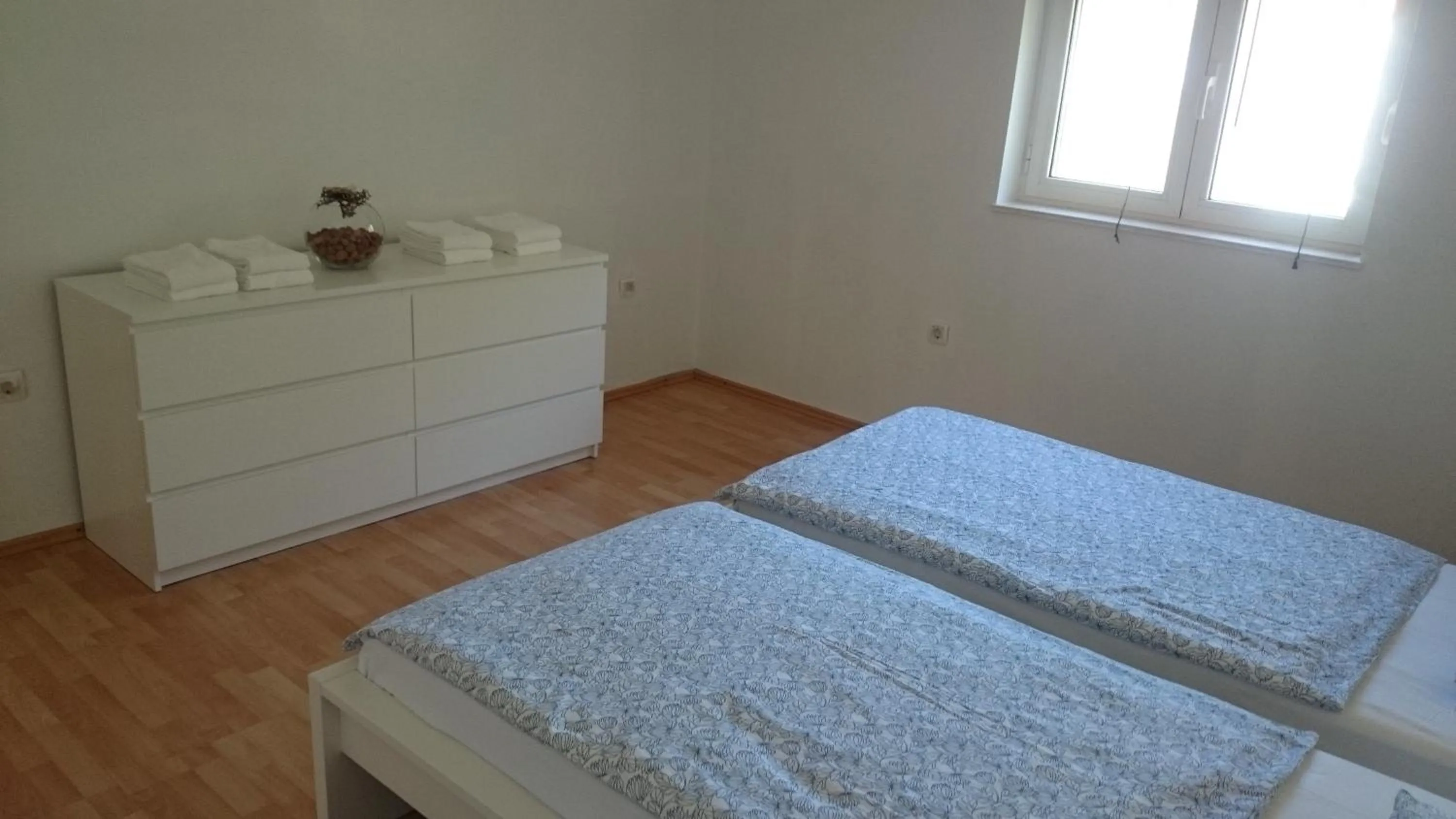 Bed in Apartments Yvonne