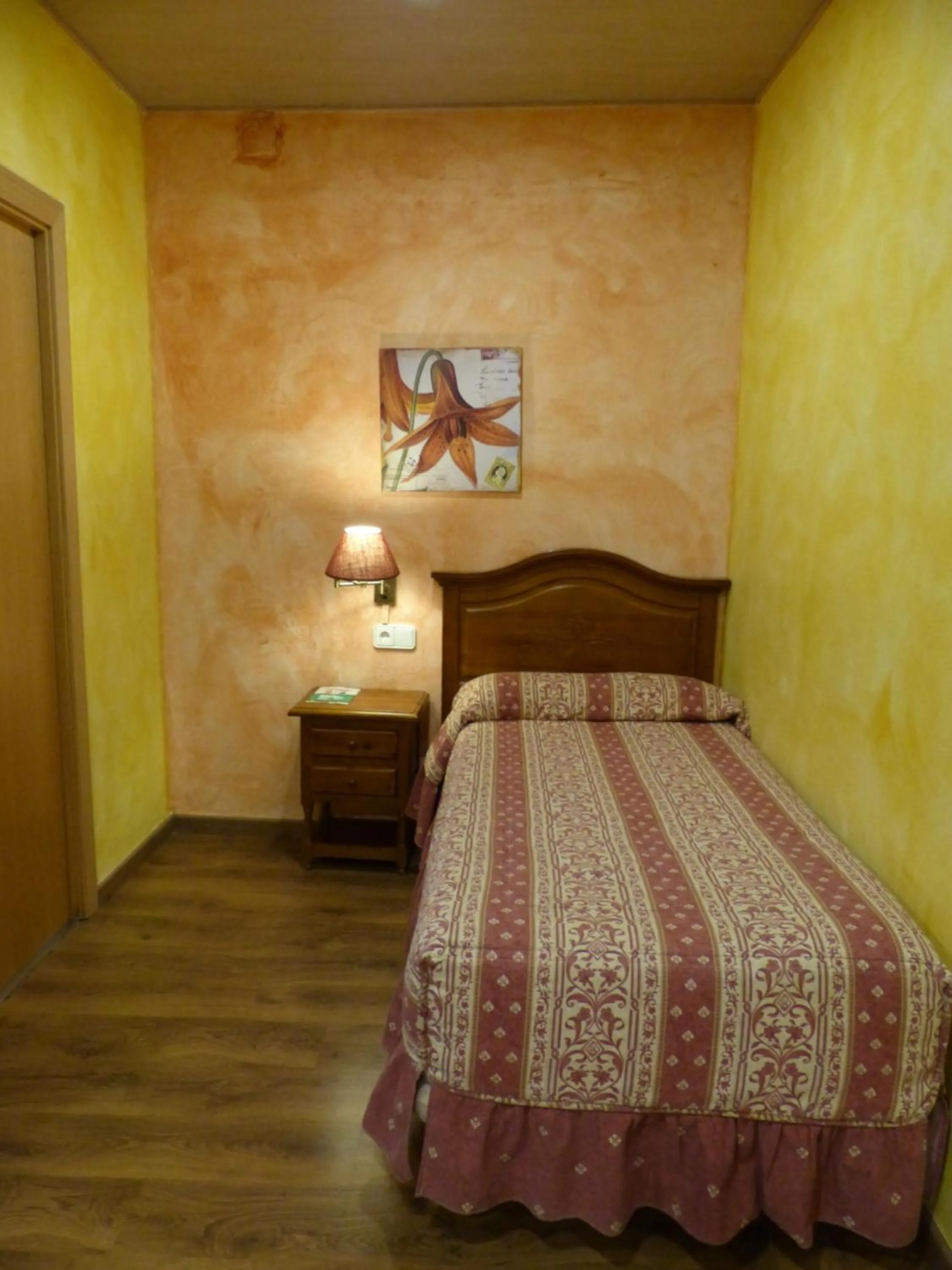 Bed in Hostal Vall D'Aneu by Arcas & Sambola