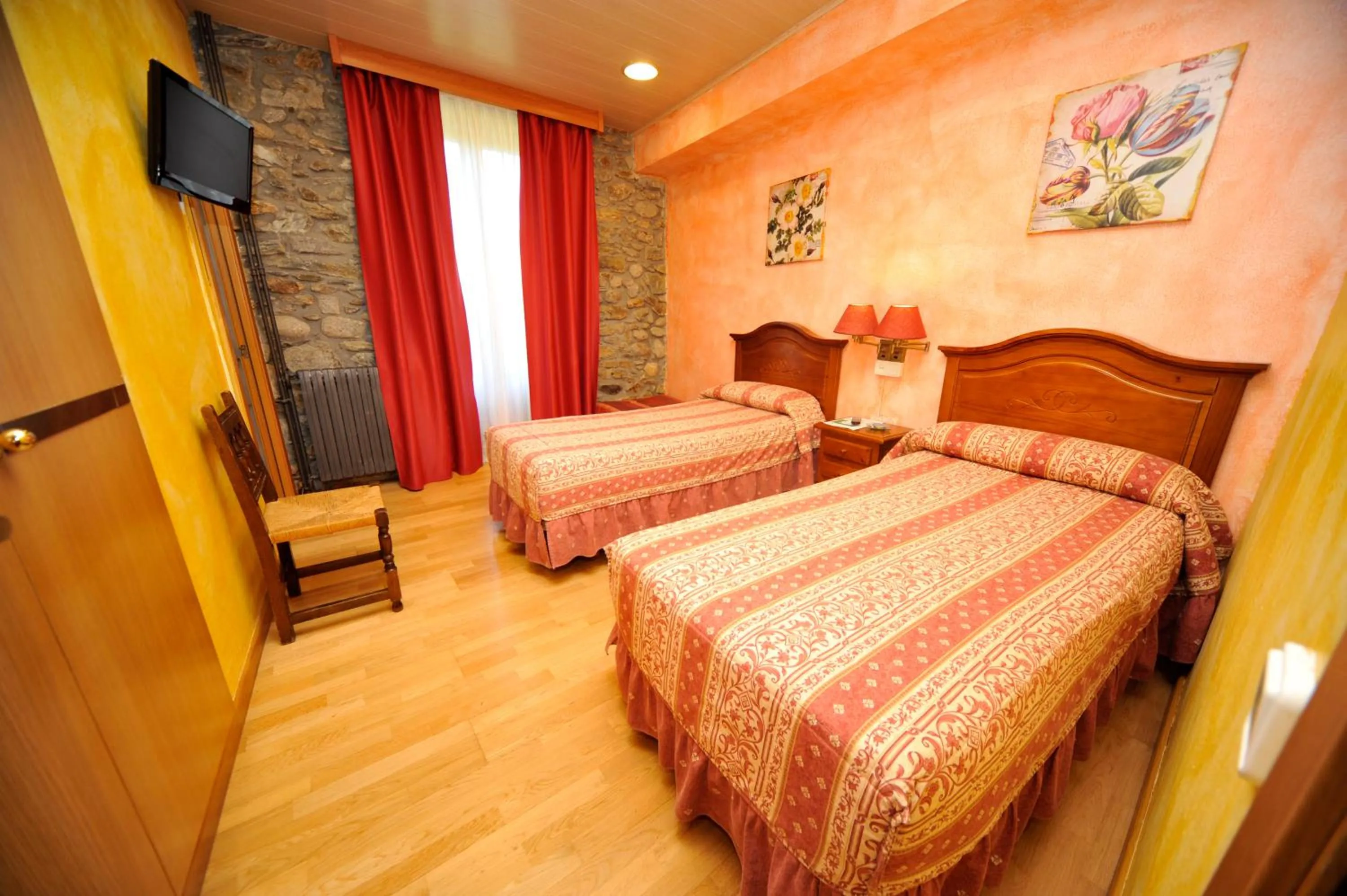 Bed in Hostal Vall D'Aneu by Arcas & Sambola