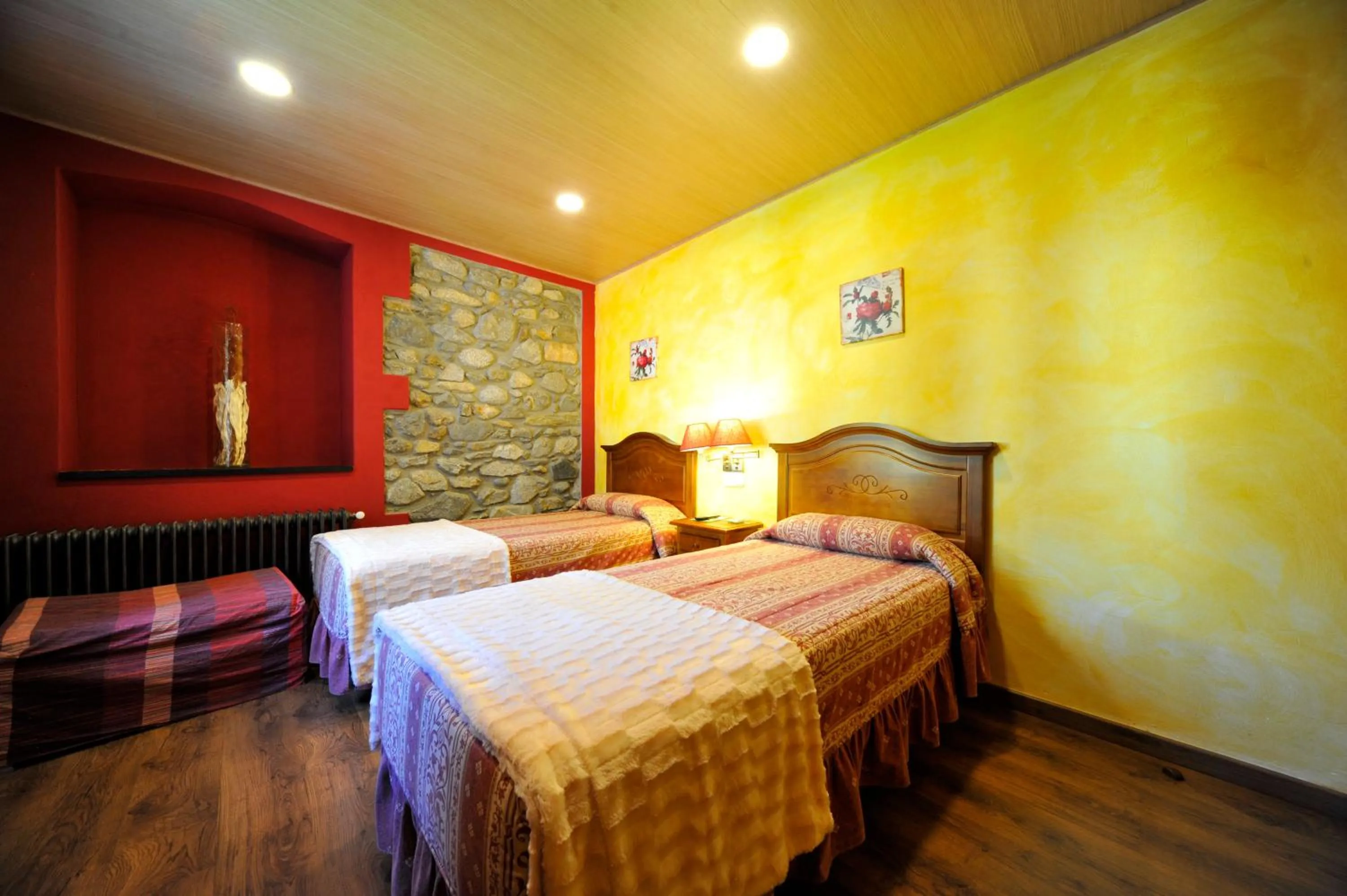 Bed in Hostal Vall D'Aneu by Arcas & Sambola