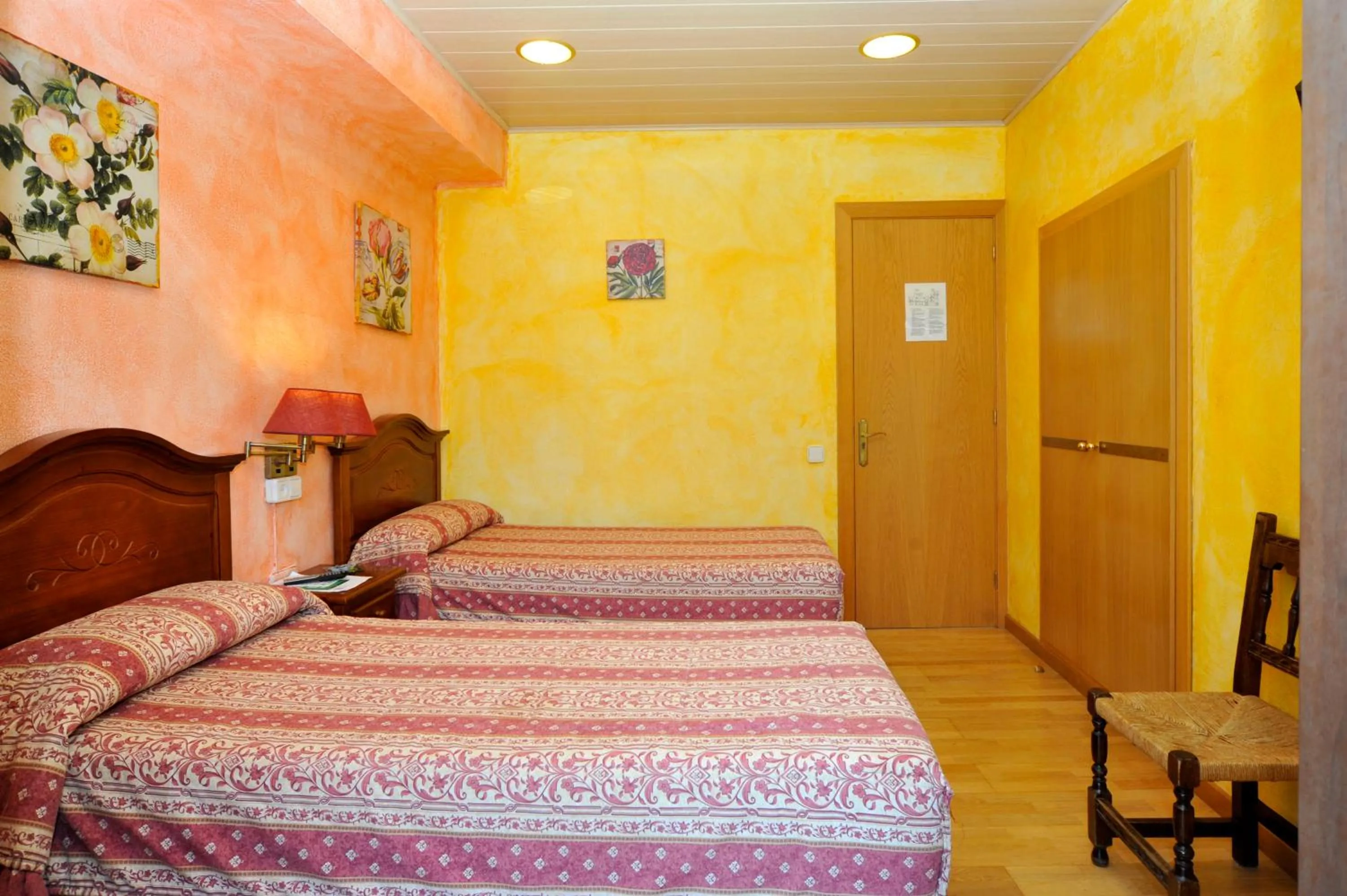 Bed in Hostal Vall D'Aneu by Arcas & Sambola