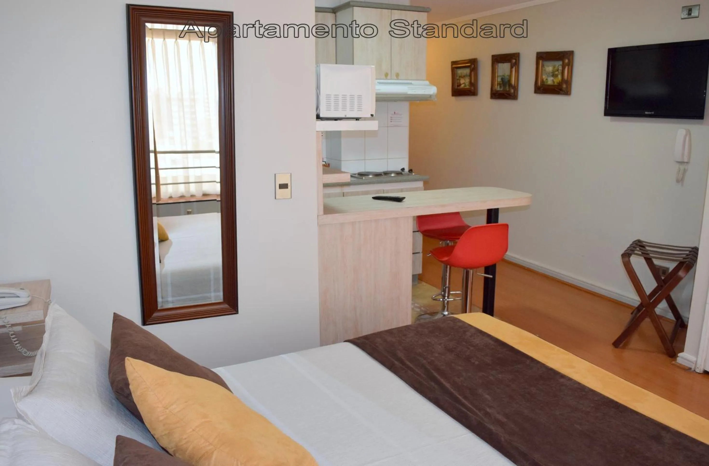 Photo of the whole room in Apart Hotel Cambiaso