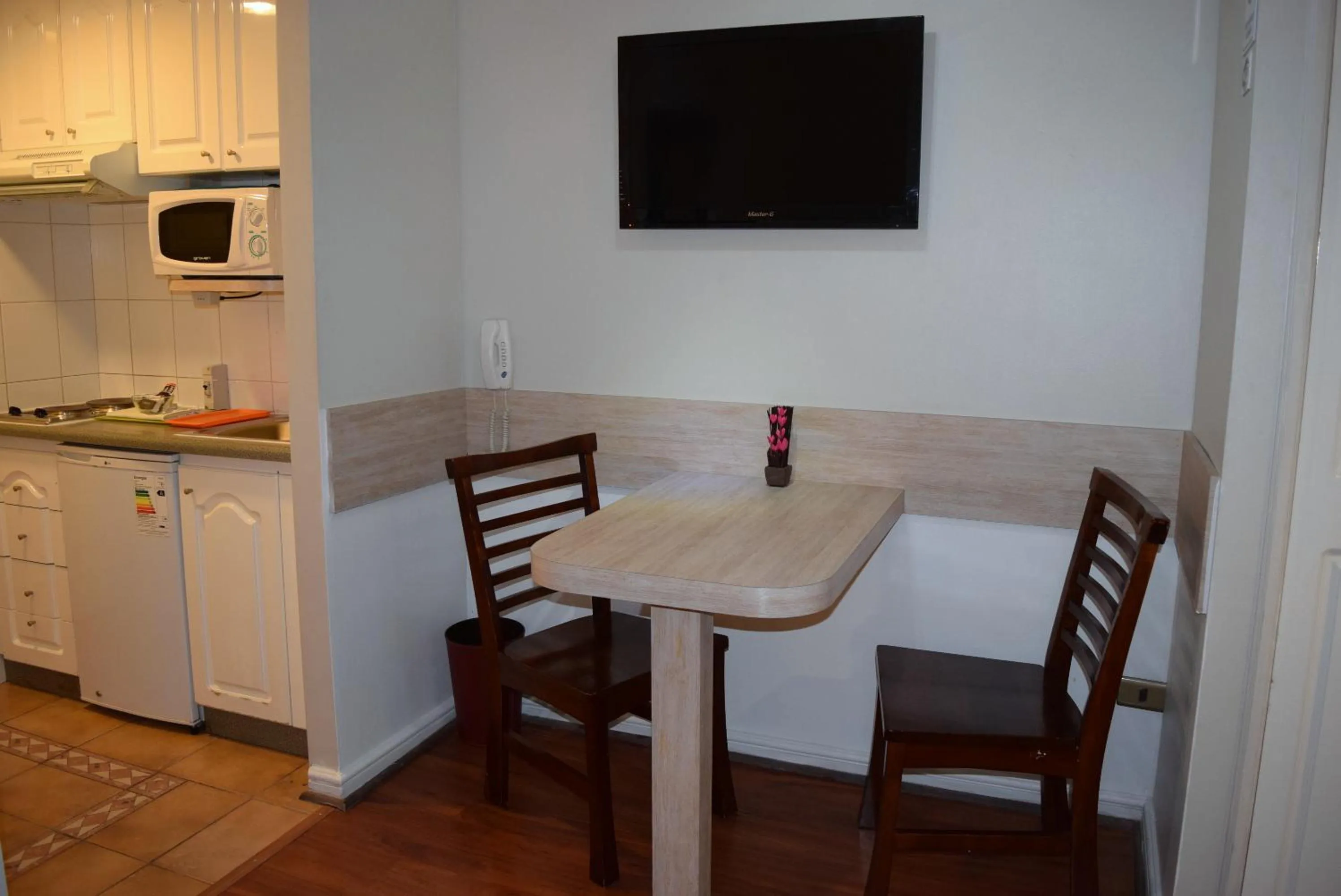 Dining area in Apart Hotel Cambiaso
