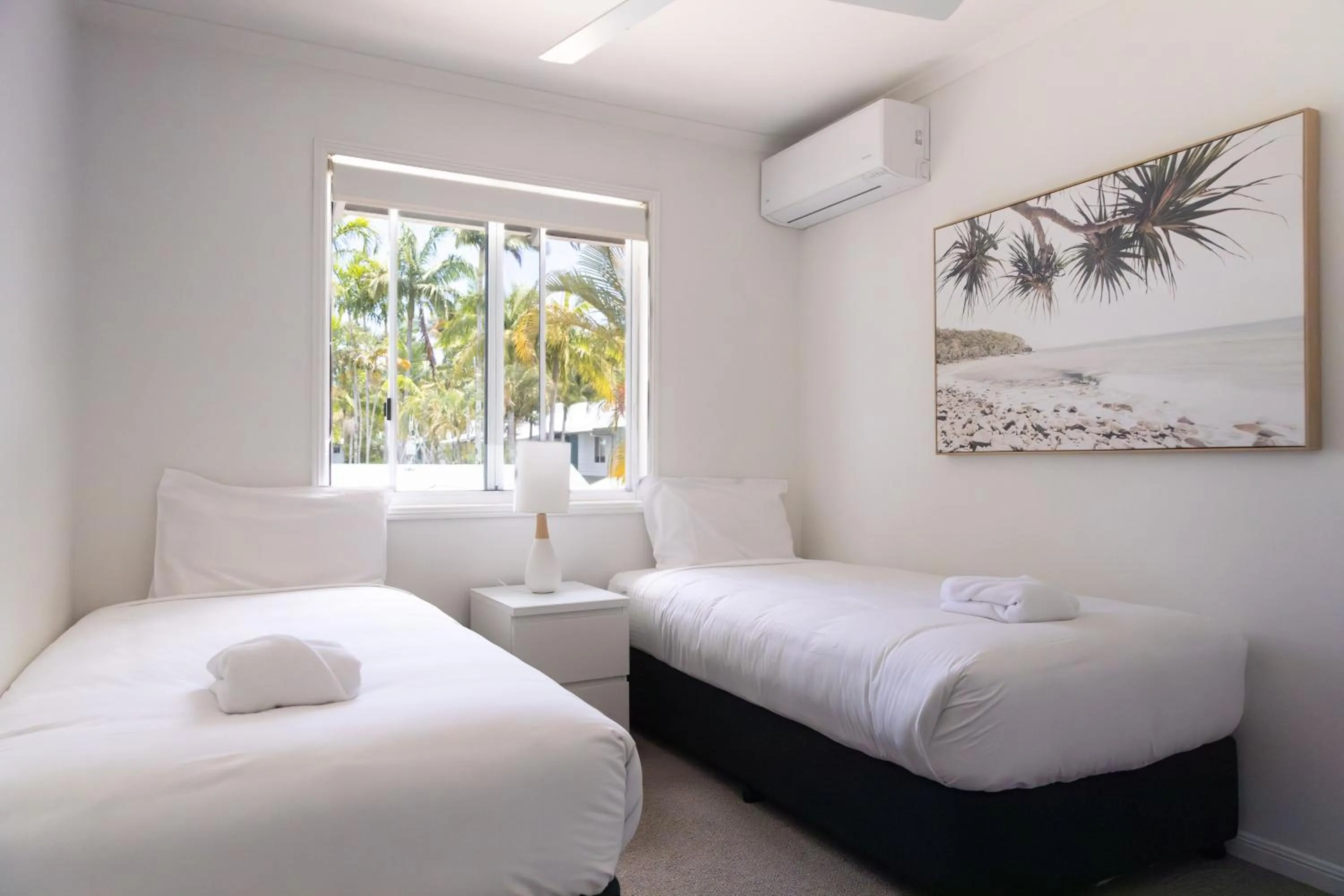 Bed in Coral Beach Noosa Resort