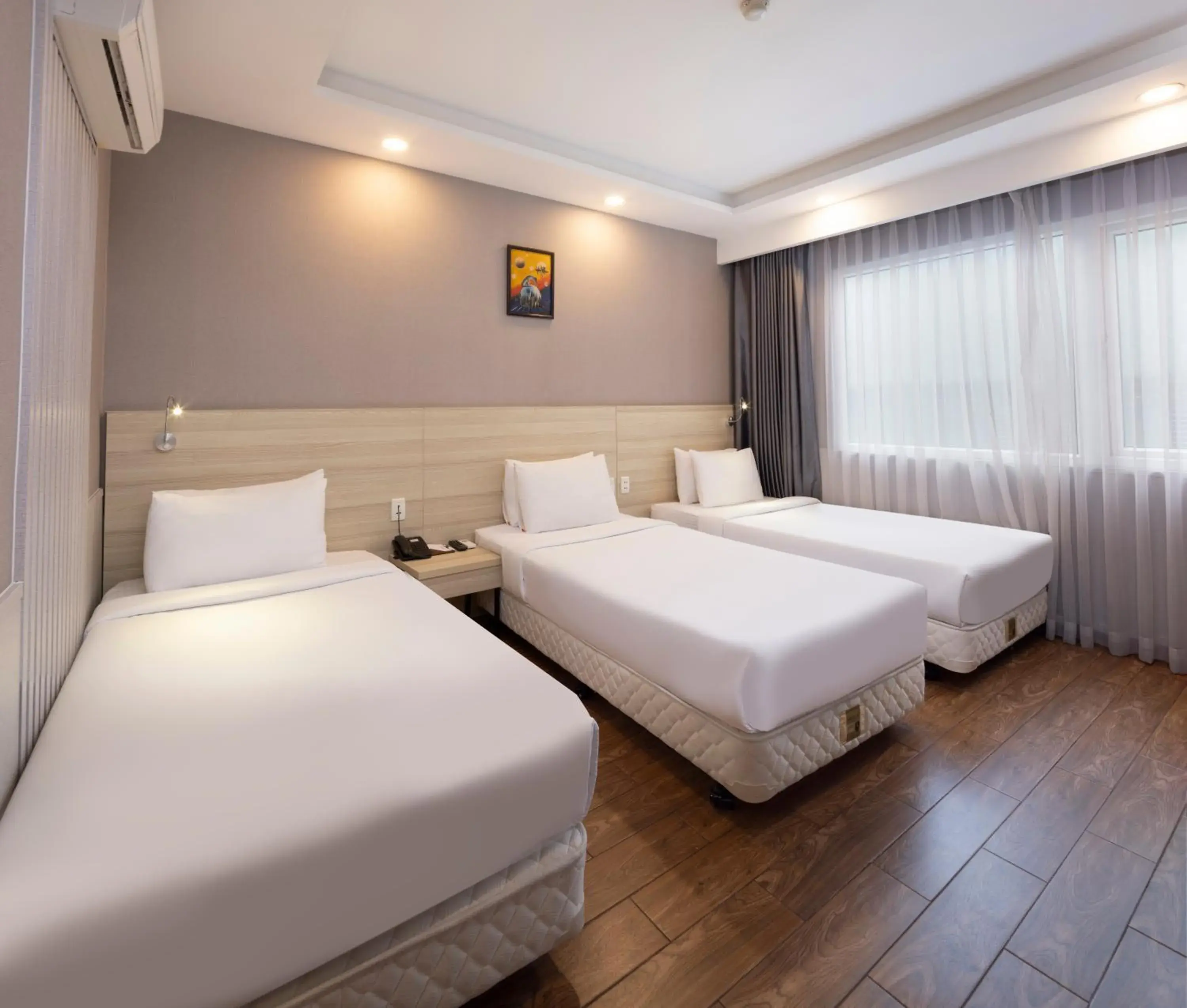 Deluxe Triple Room in Sen Viet Hotel Deluxe Triple Room in Sen Viet Hotel