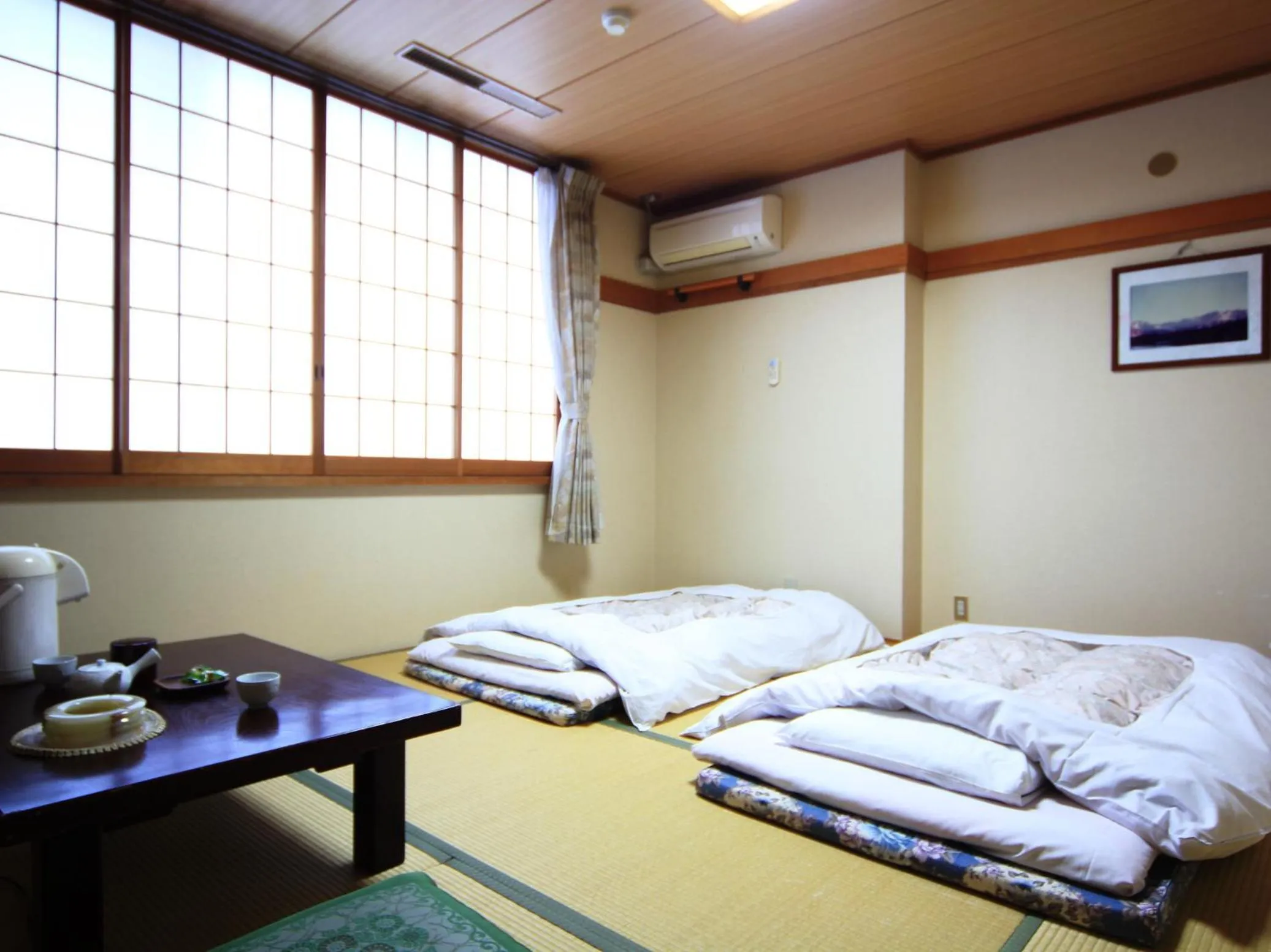 Photo of the whole room, Bed in Komao