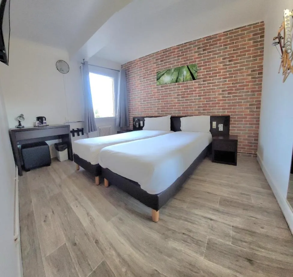 Bed in Hotel Au Spatial