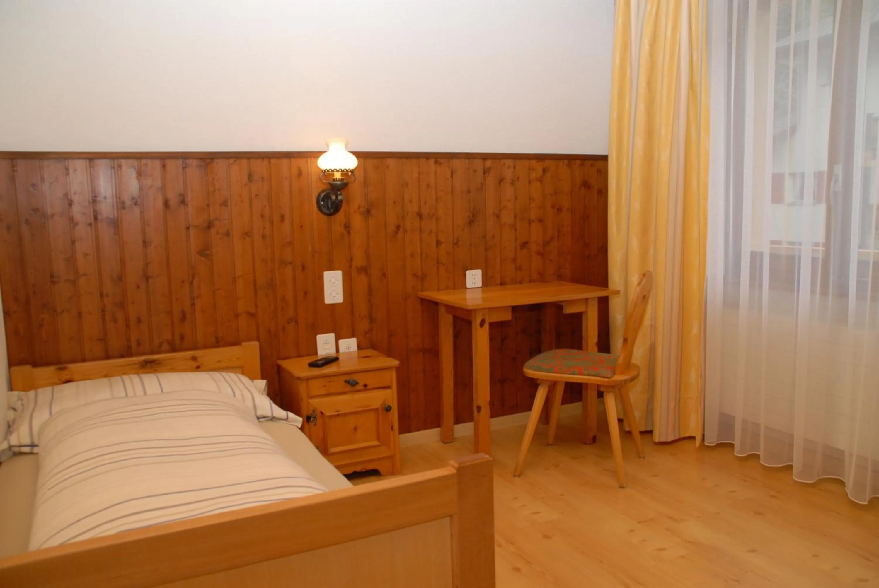 Bed in Hotel Fiescherhof