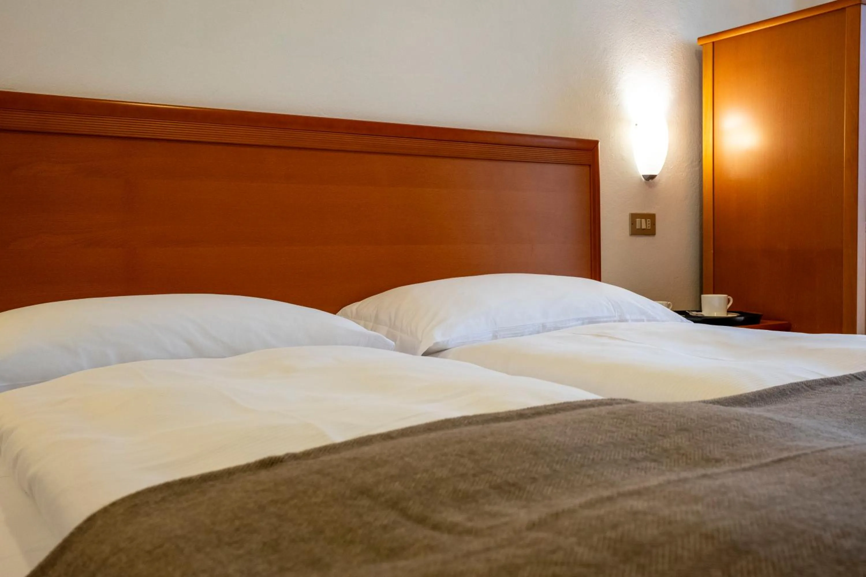 Bed in Hotel Costaverde "ai Roni"