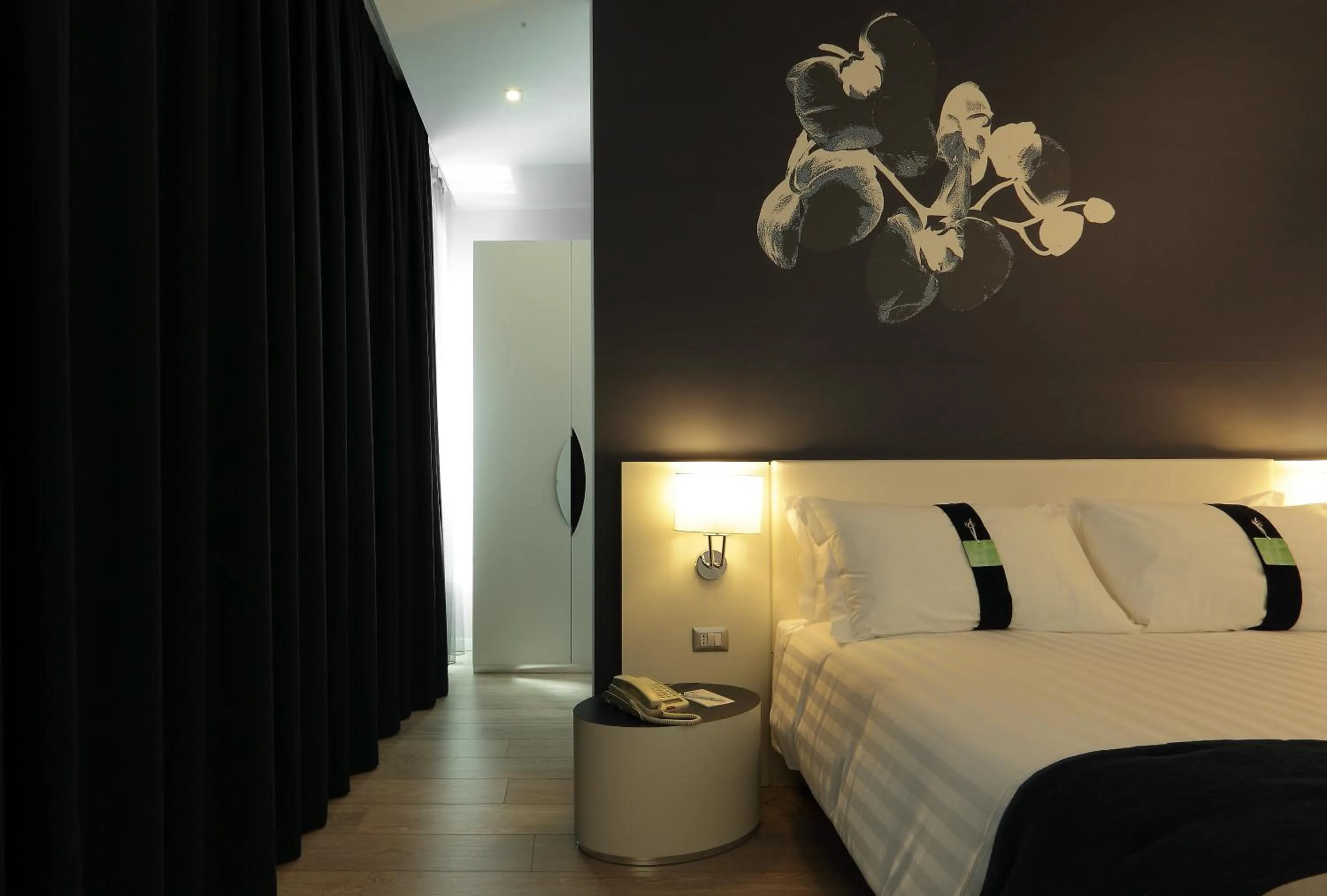 Decorative detail, Bed in Holiday Inn Milan Nord Zara by IHG