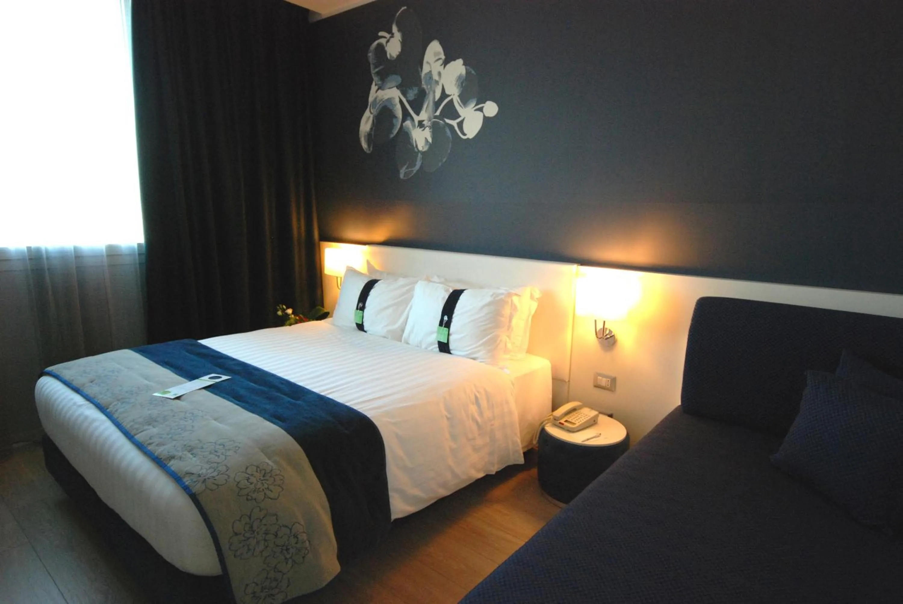 Decorative detail, Bed in Holiday Inn Milan Nord Zara by IHG