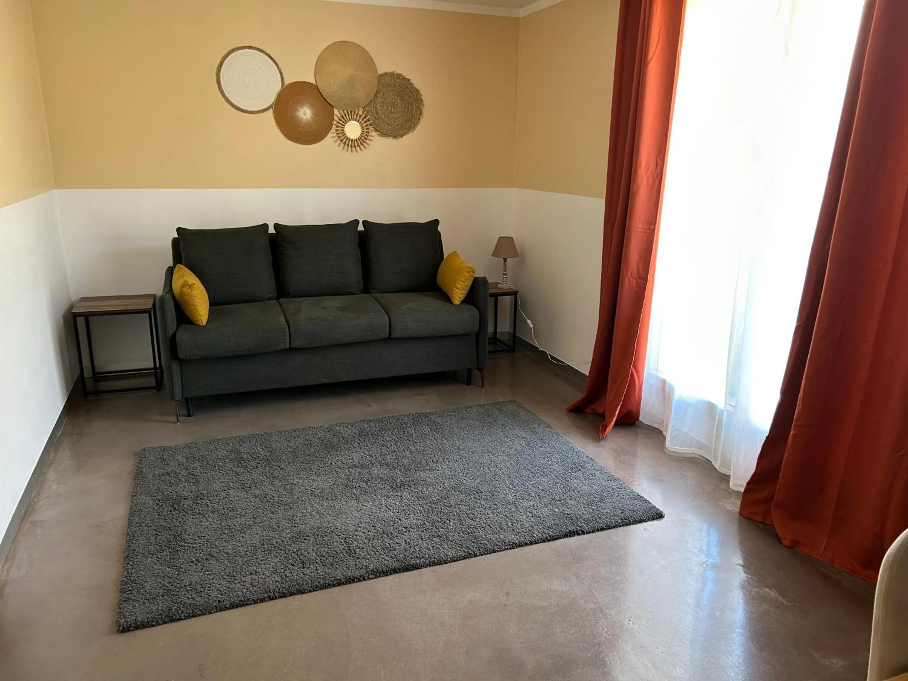 Living room in Logis Hotel De La Clape