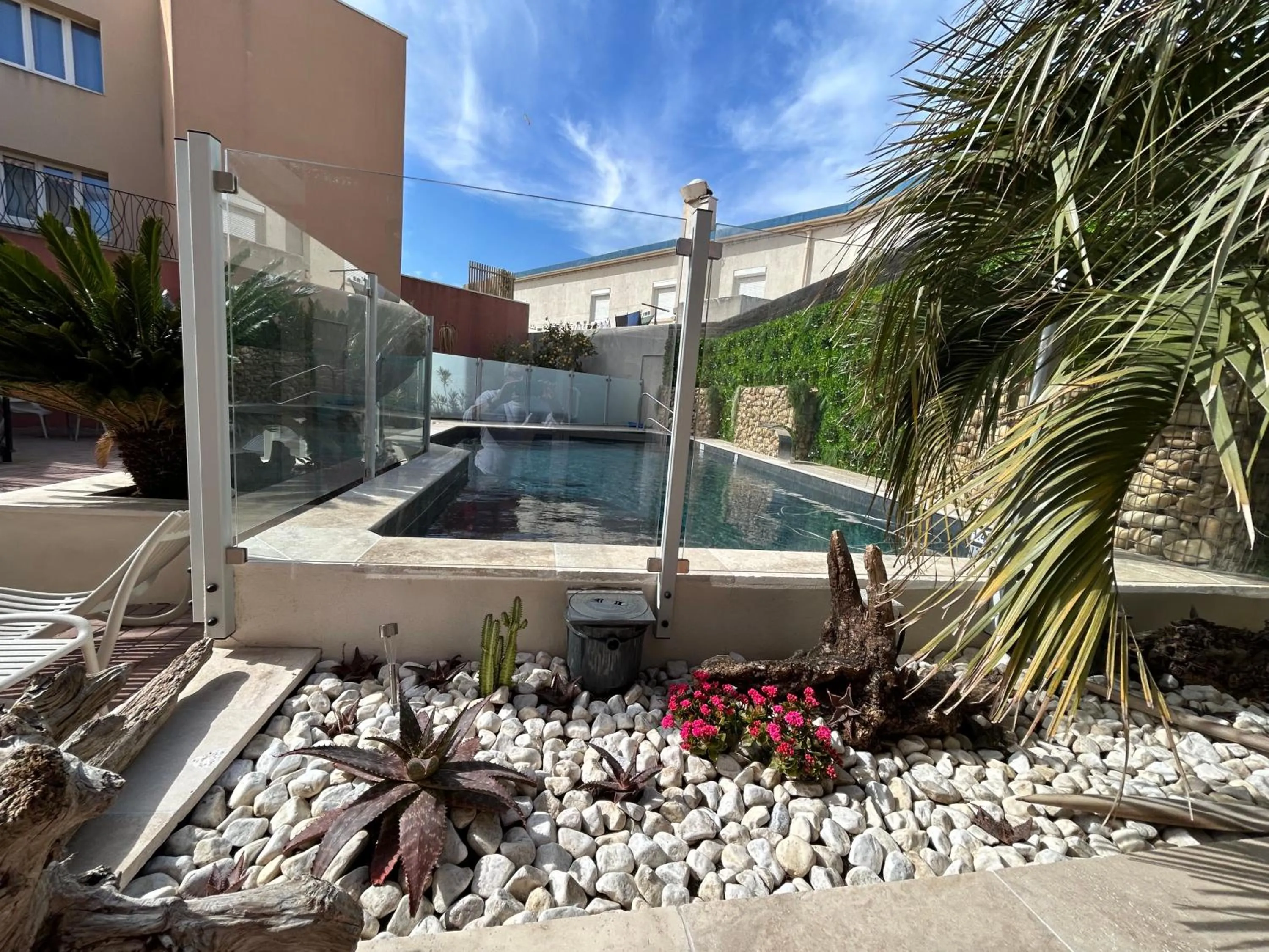 Swimming pool in Logis Hotel De La Clape