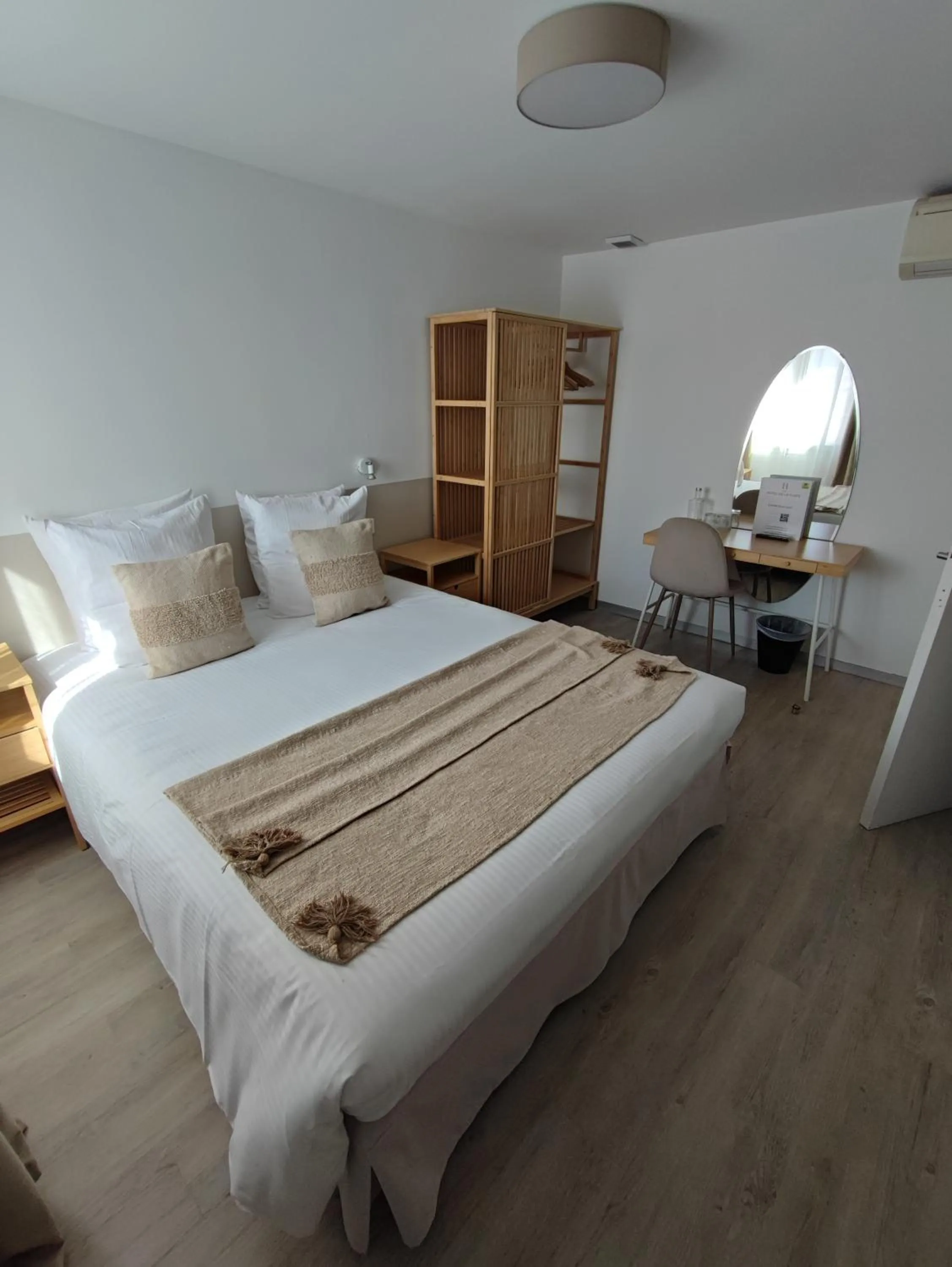 Bed in Logis Hotel De La Clape