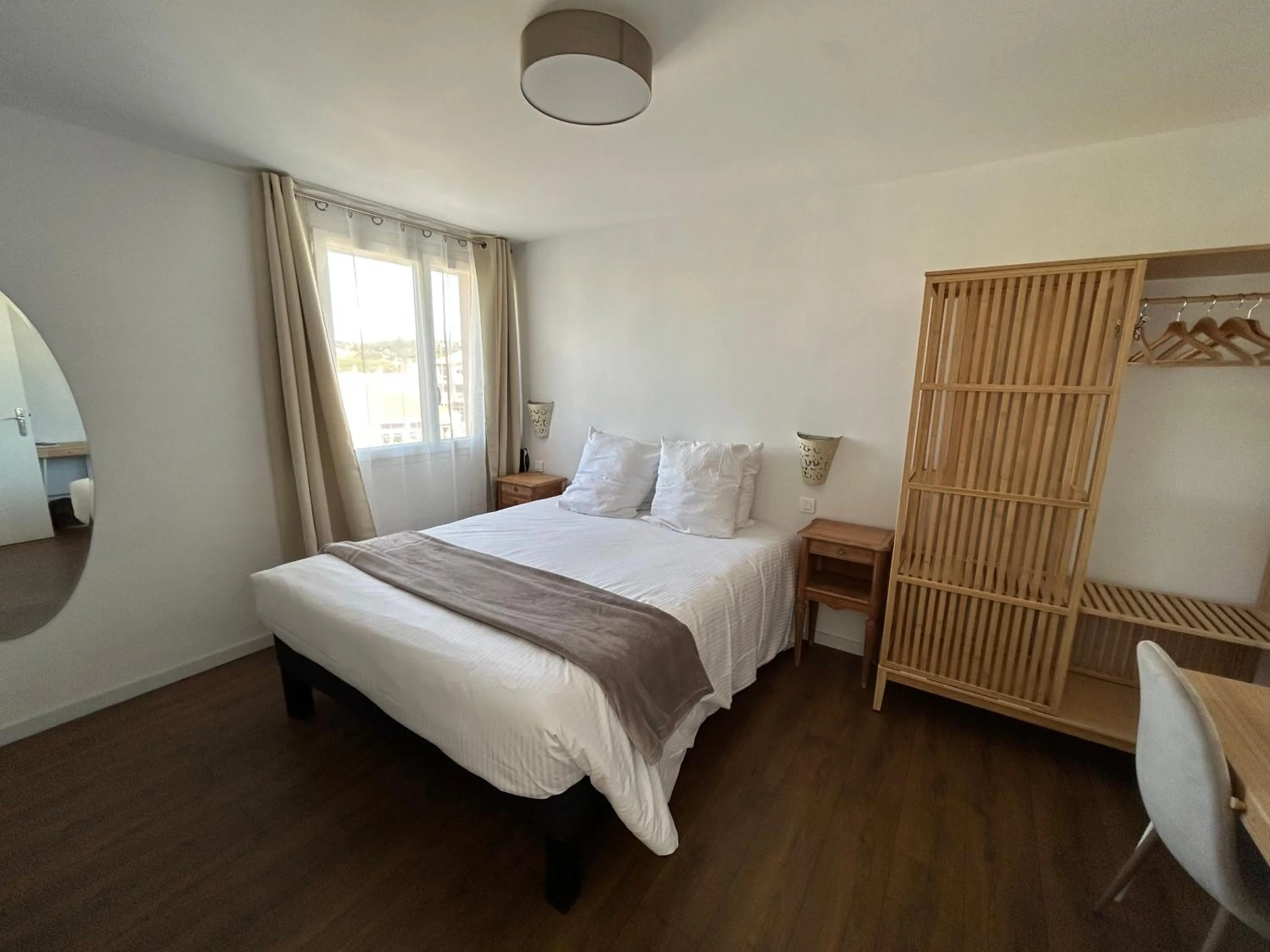 Bed in Logis Hotel De La Clape