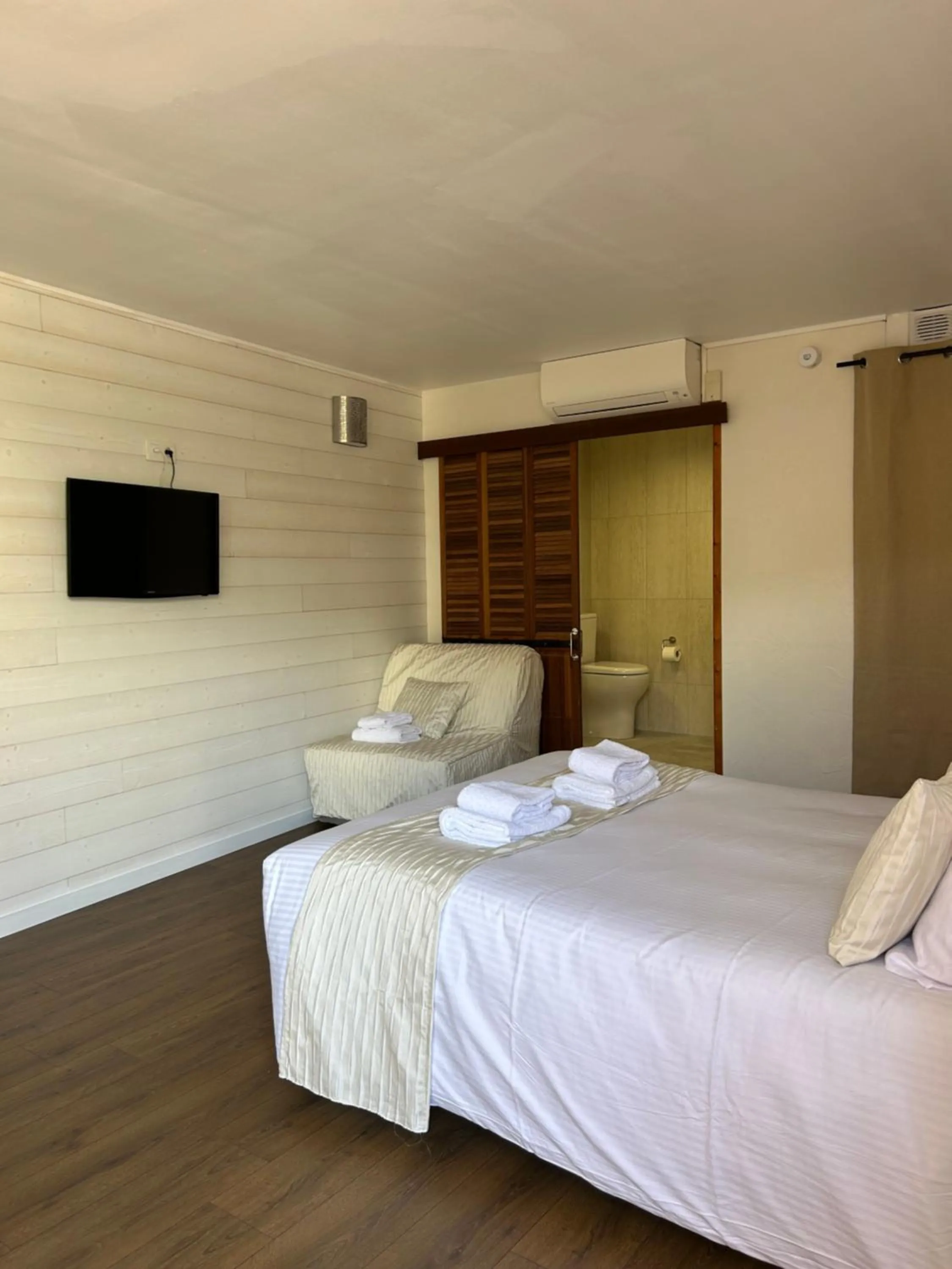 Photo of the whole room, Bed in Logis Hotel De La Clape