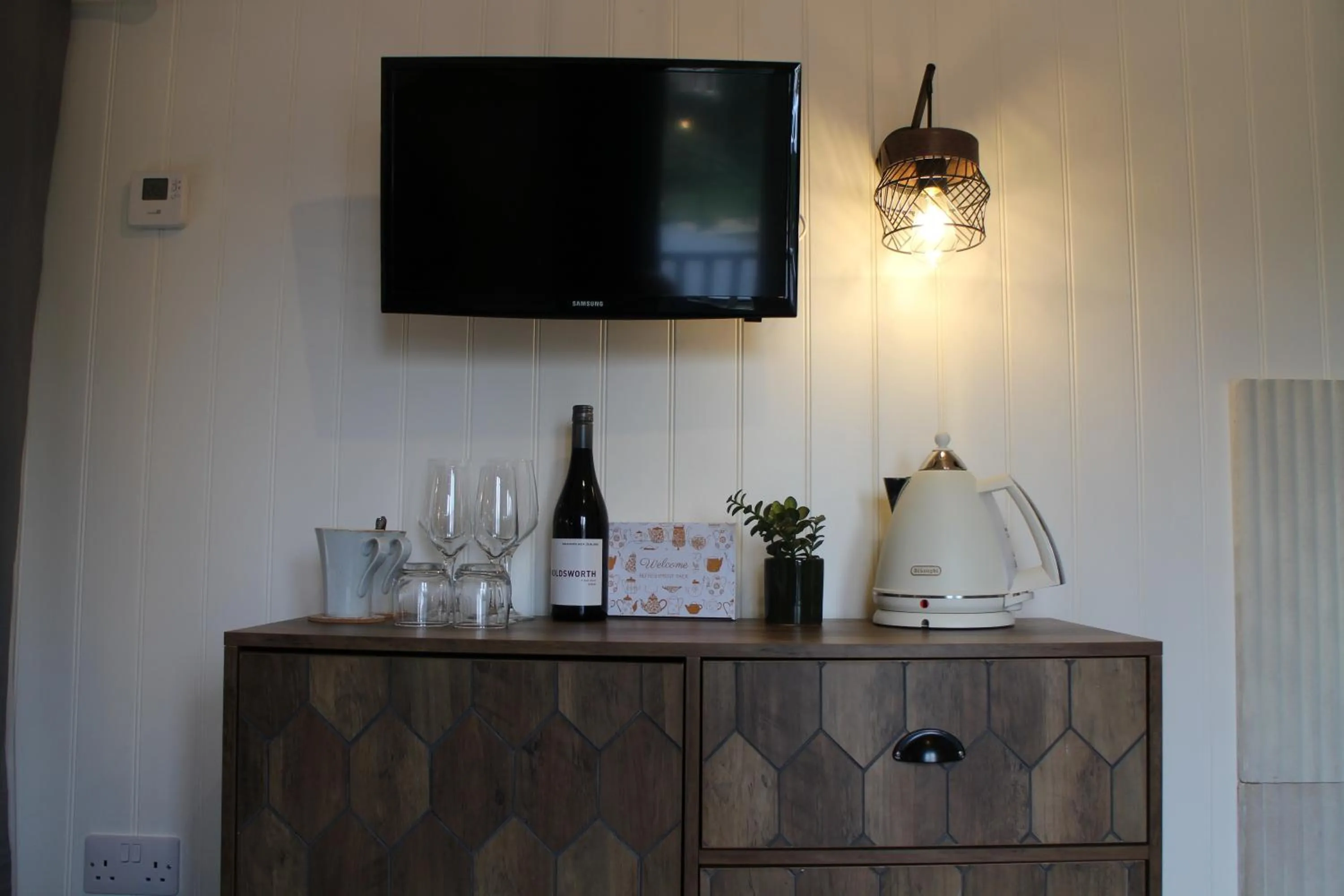 Communal lounge/ TV room in The Apple Inn