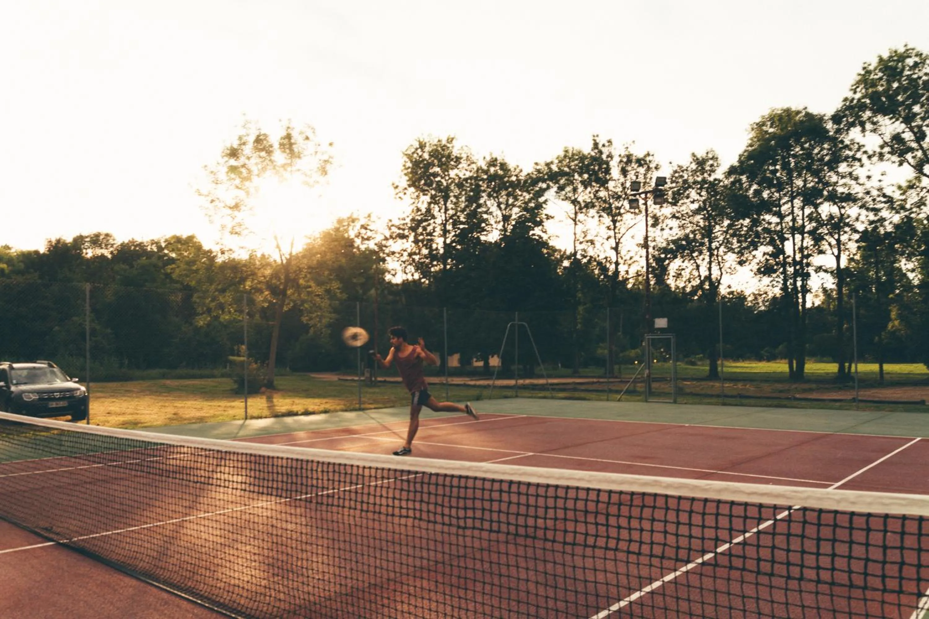 Tennis court in Terres de France - Moncontour Active Park