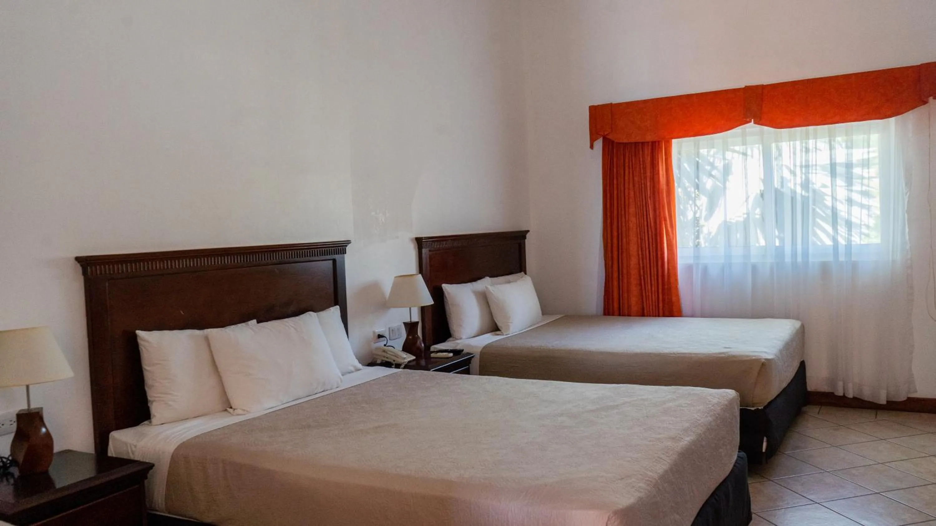 Bed in Hotel Cayman Suites