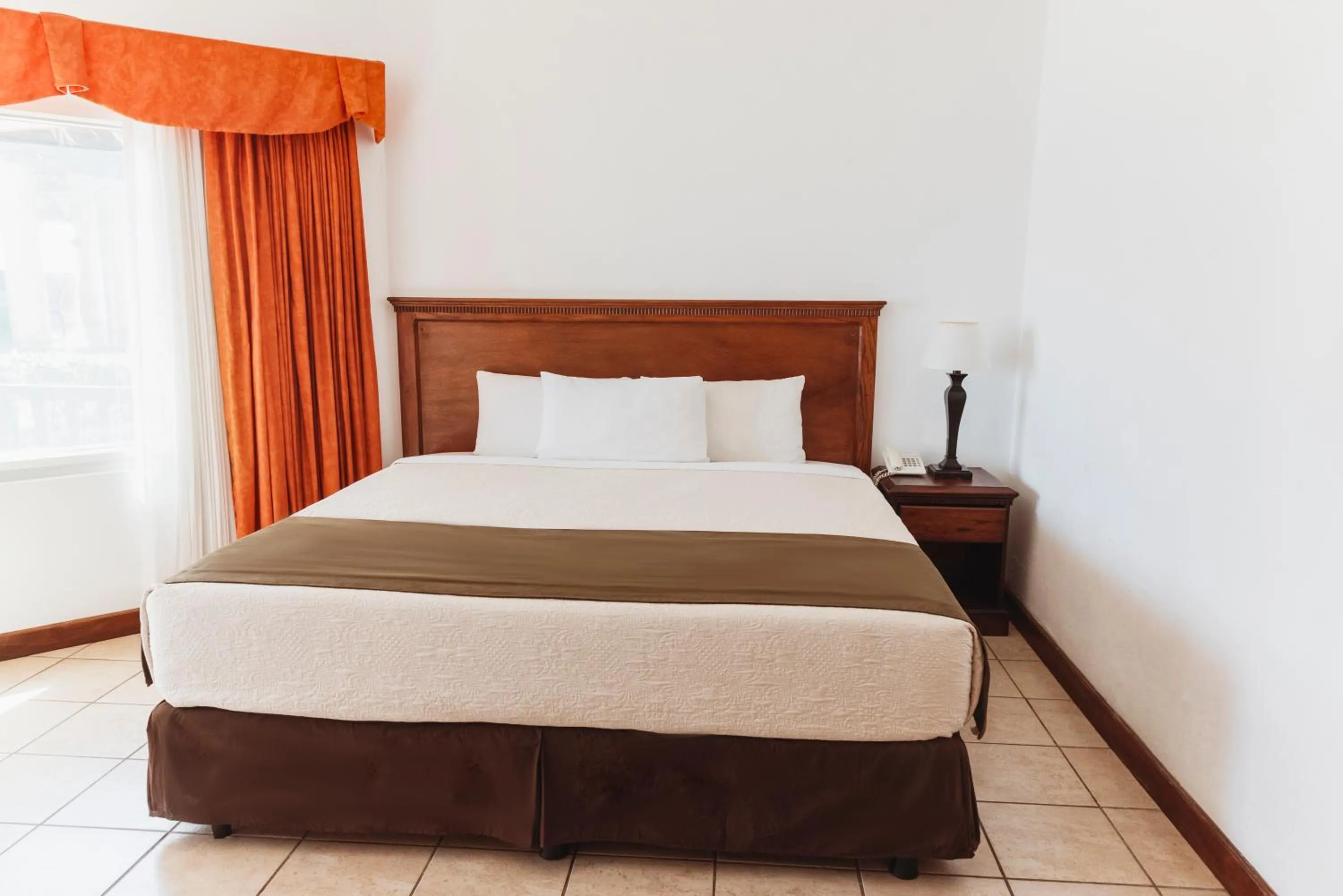 Bed in Hotel Cayman Suites