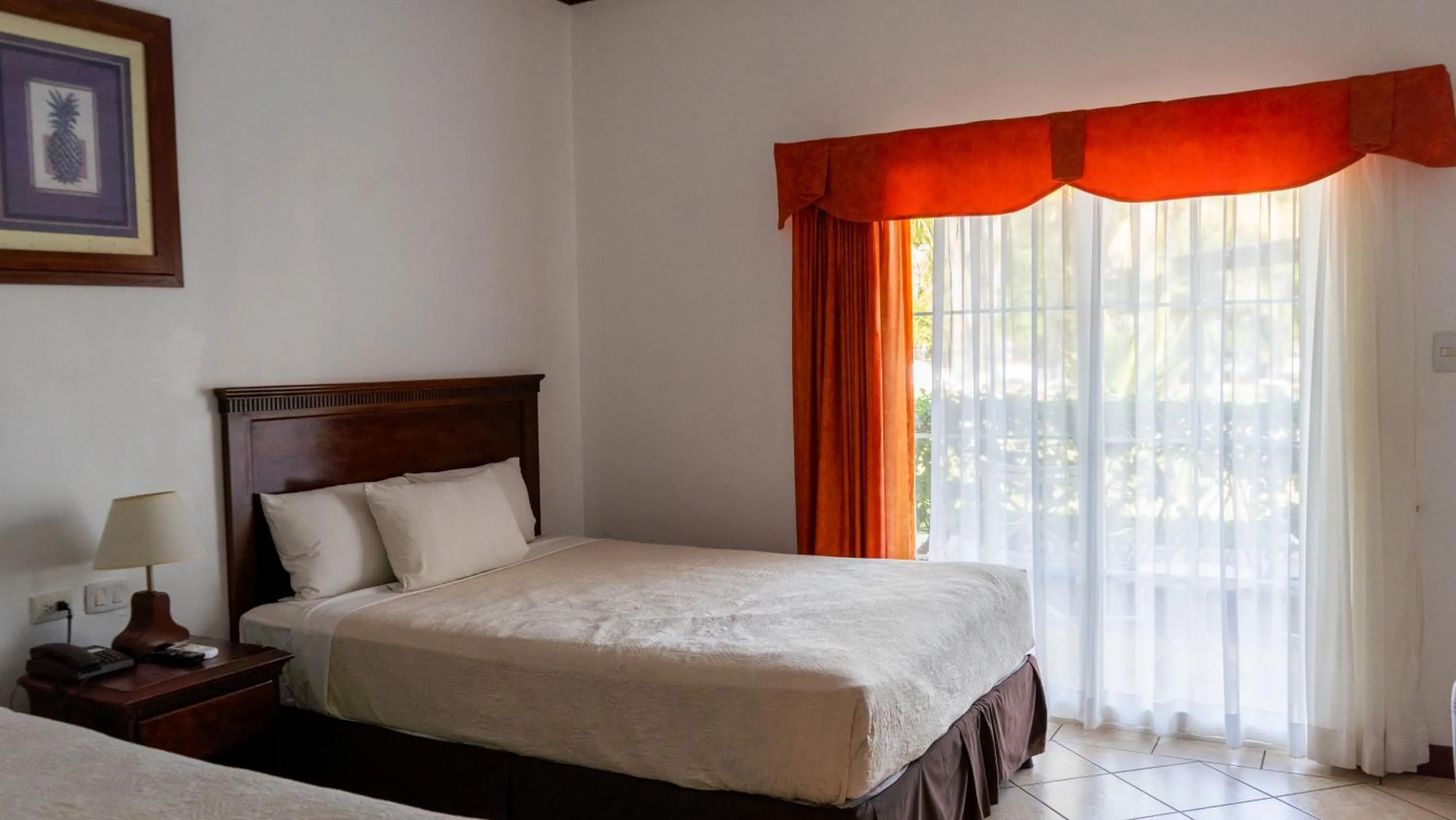 Bed in Hotel Cayman Suites