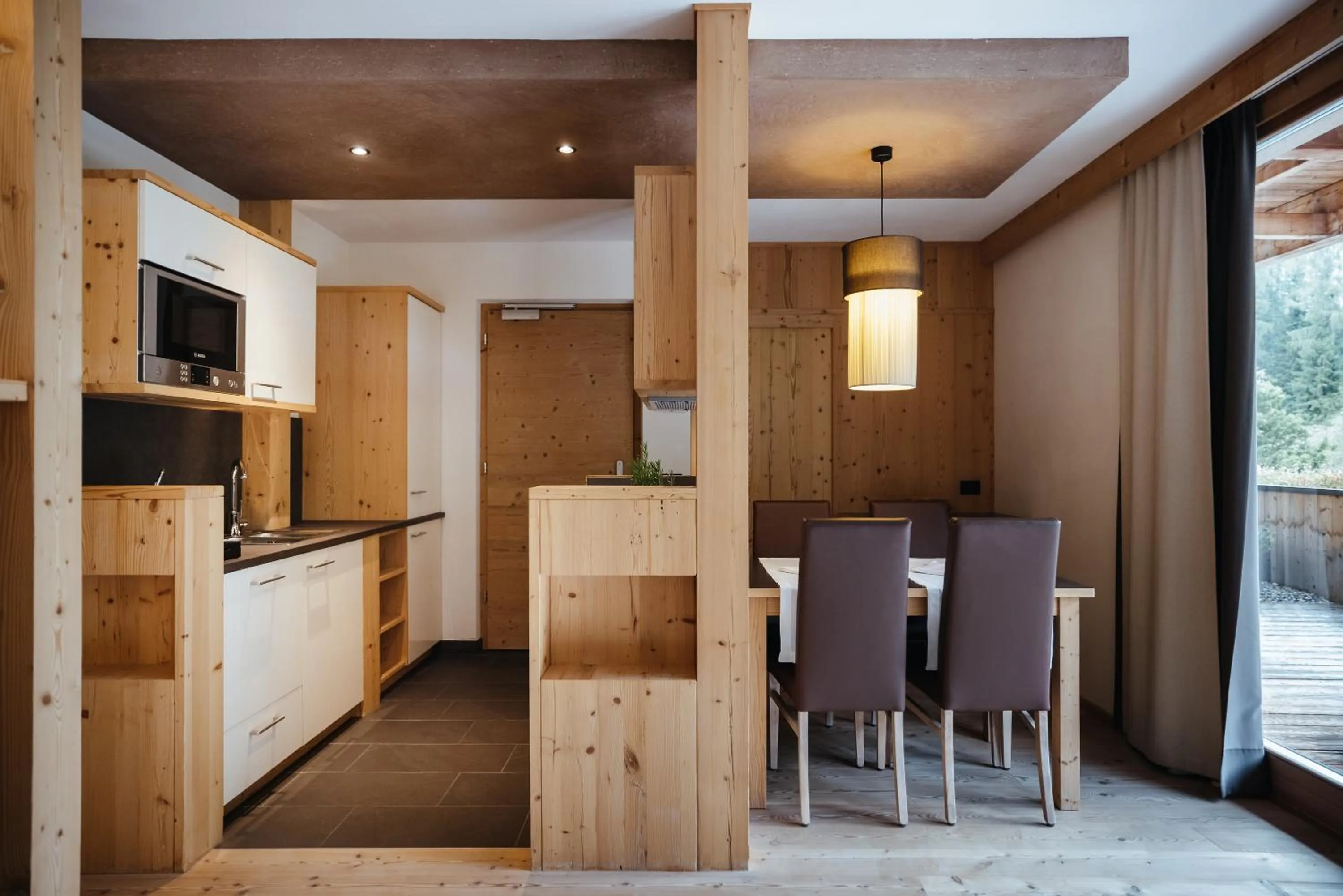 Kitchen or kitchenette in Lagació Hotel Mountain Residence