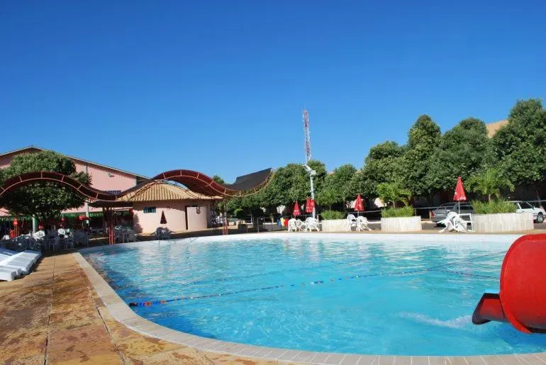 Swimming pool in diRoma Fiori Caldas Novas - ACHEI FERIAS - Com Roupa de Cama
