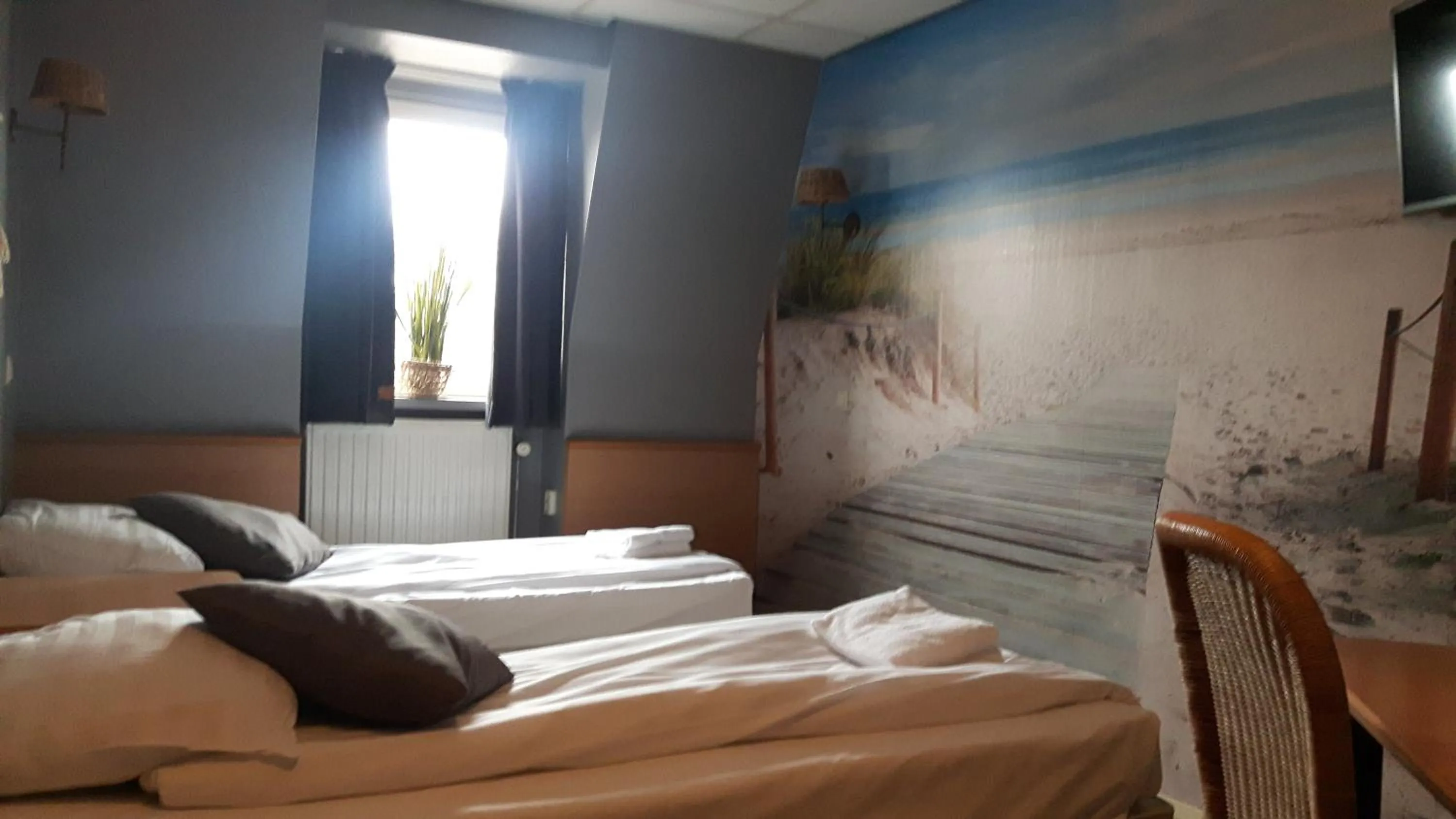 Photo of the whole room, Bed in Hotel Velsen