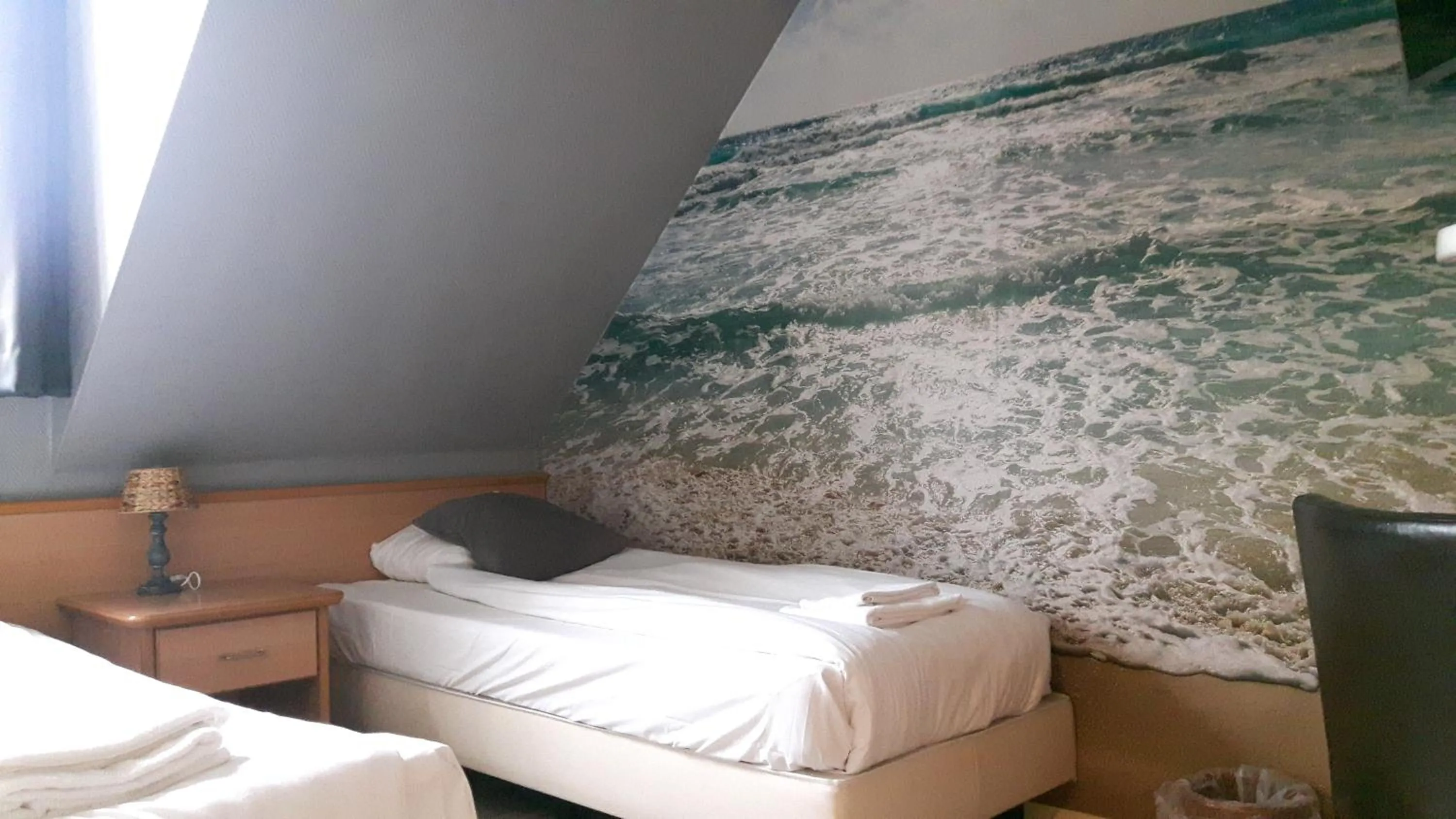 Photo of the whole room, Bed in Hotel Velsen