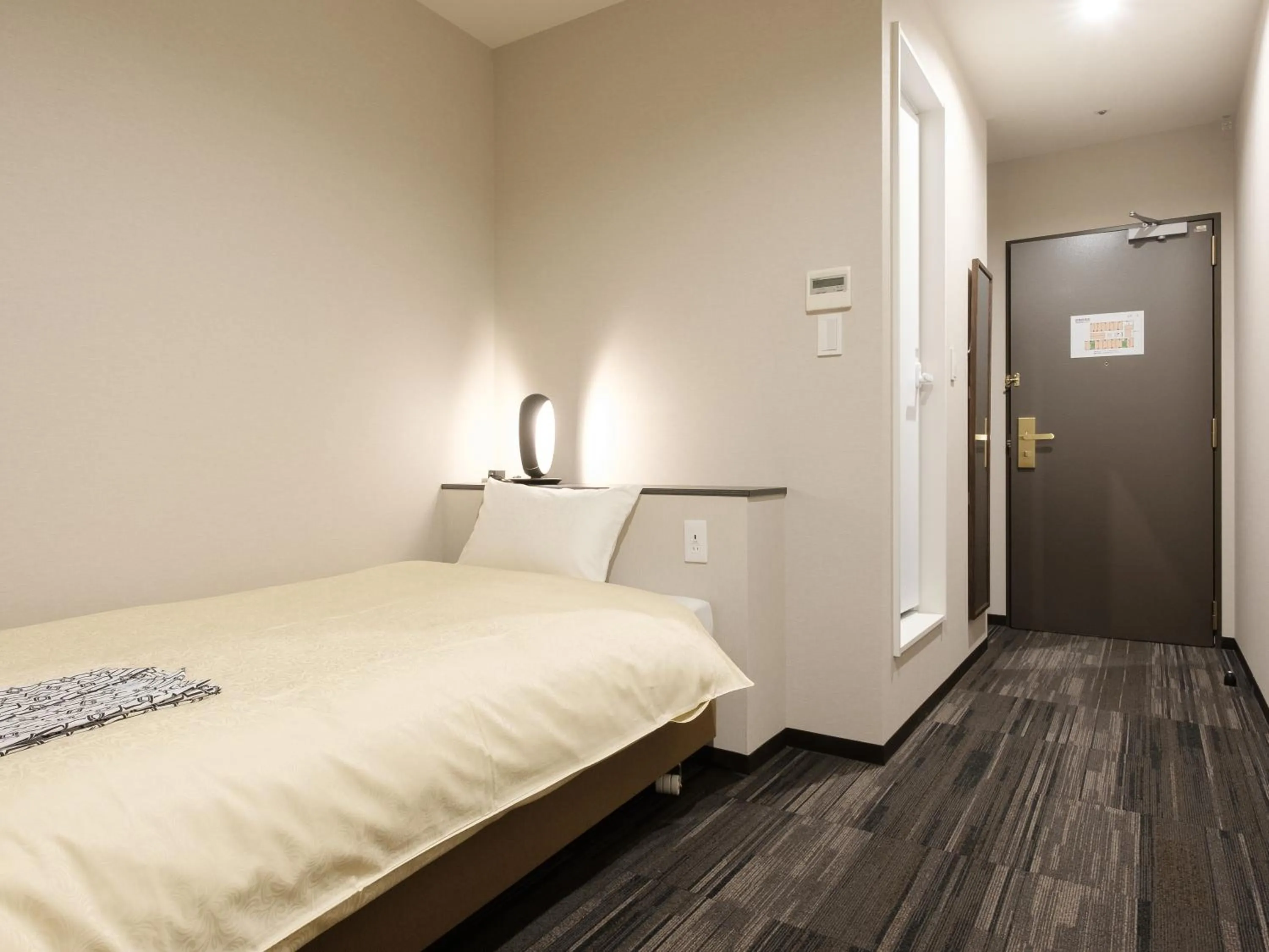 Bed in The Premium Hotel In Rinku